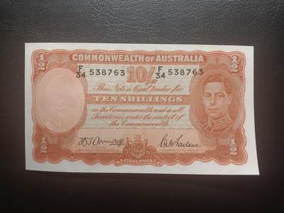2025十一月第五期，总第203期 - 澳大利亚1942年10先令AUNC，乔治六世国王和工匠浮雕，较少见二战时期签名