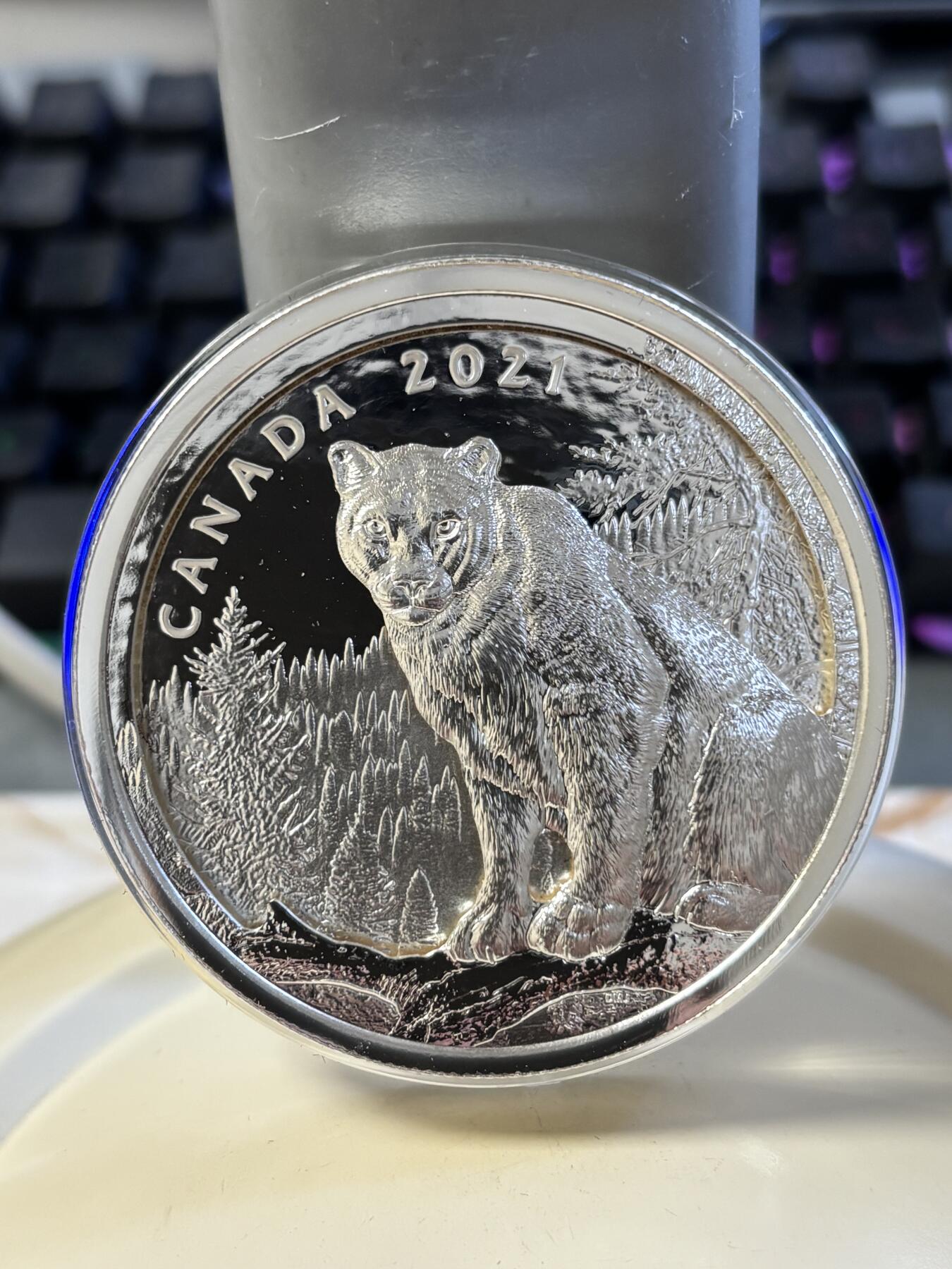 第182期拍卖 加拿大2021年美洲狮多层雕刻立体镂空105.6克纪念银币，9999银，发行1500枚