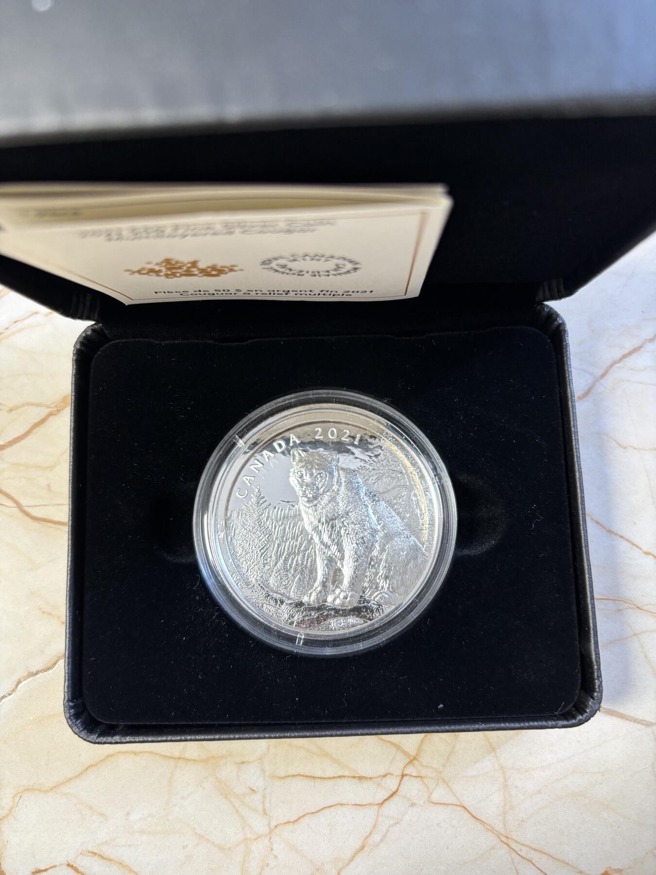 第182期拍卖 加拿大2021年美洲狮多层雕刻立体镂空105.6克纪念银币，9999银，发行1500枚