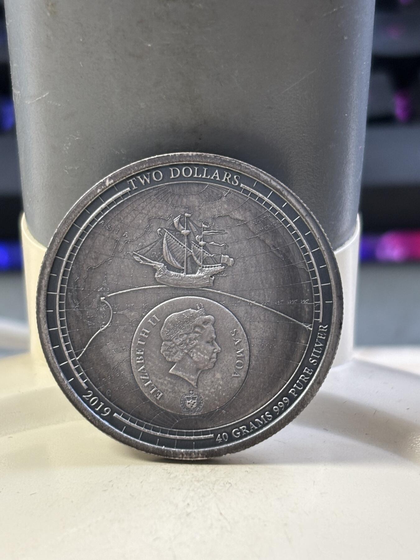 第182期拍卖 萨摩亚2019麦哲伦环球航海500周年凹面弧形银币，999银，40克，发行量599枚，有氧化