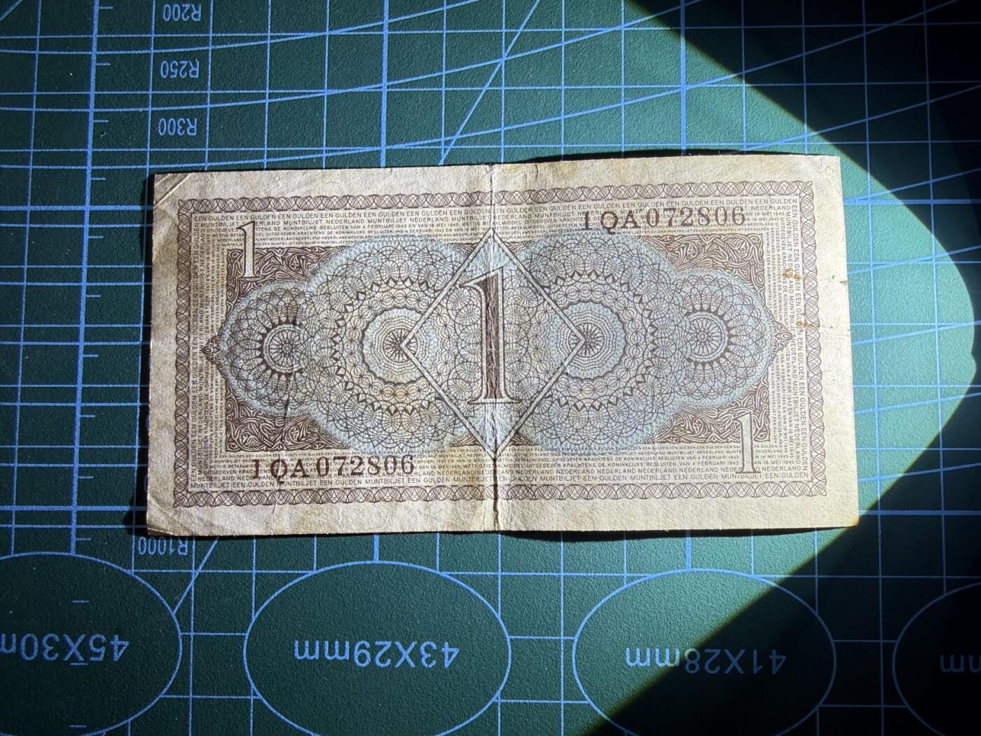 【炜奕收藏】，第五十一期 1949年荷兰1盾，品相如图