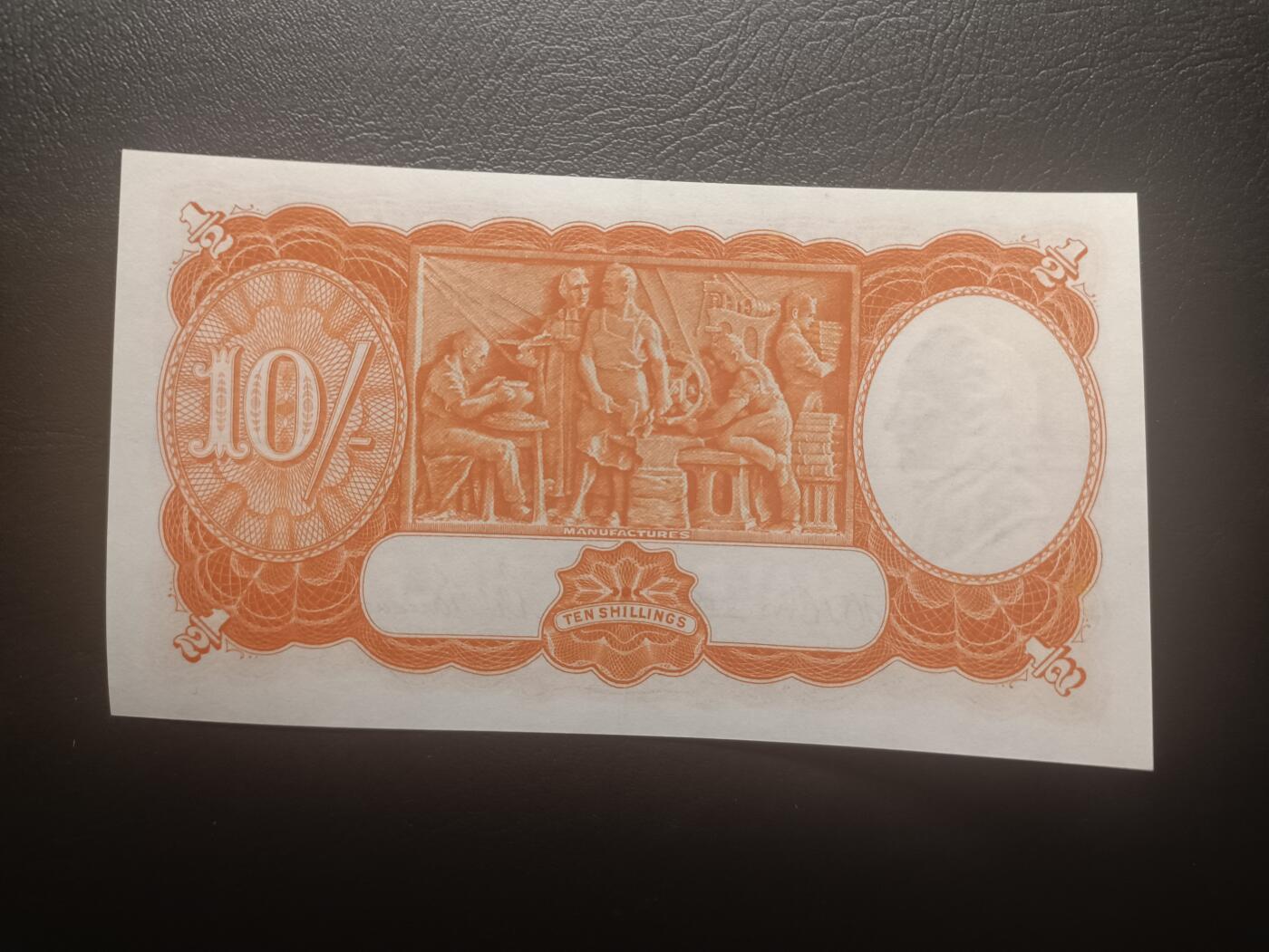 2025十一月第五期，总第203期 澳大利亚1942年10先令AUNC，乔治六世国王和工匠浮雕，较少见二战时期签名