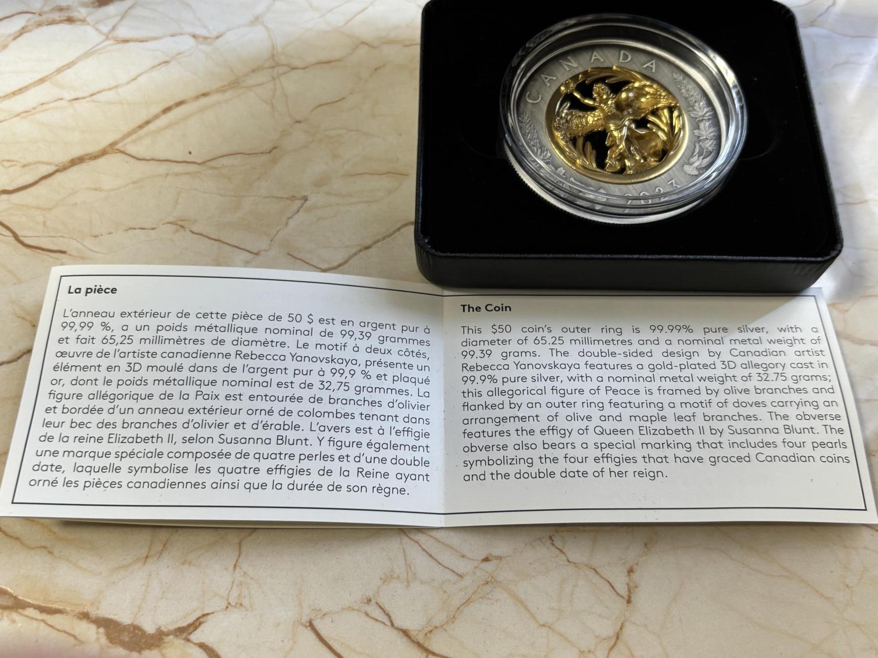 第182期拍卖 获奖加拿大2023年镂空镶嵌胜利与和平女神镀金纪念银币，9999银镀金，2盎司，发行1250枚。获克劳斯2024年度最富激情币大奖