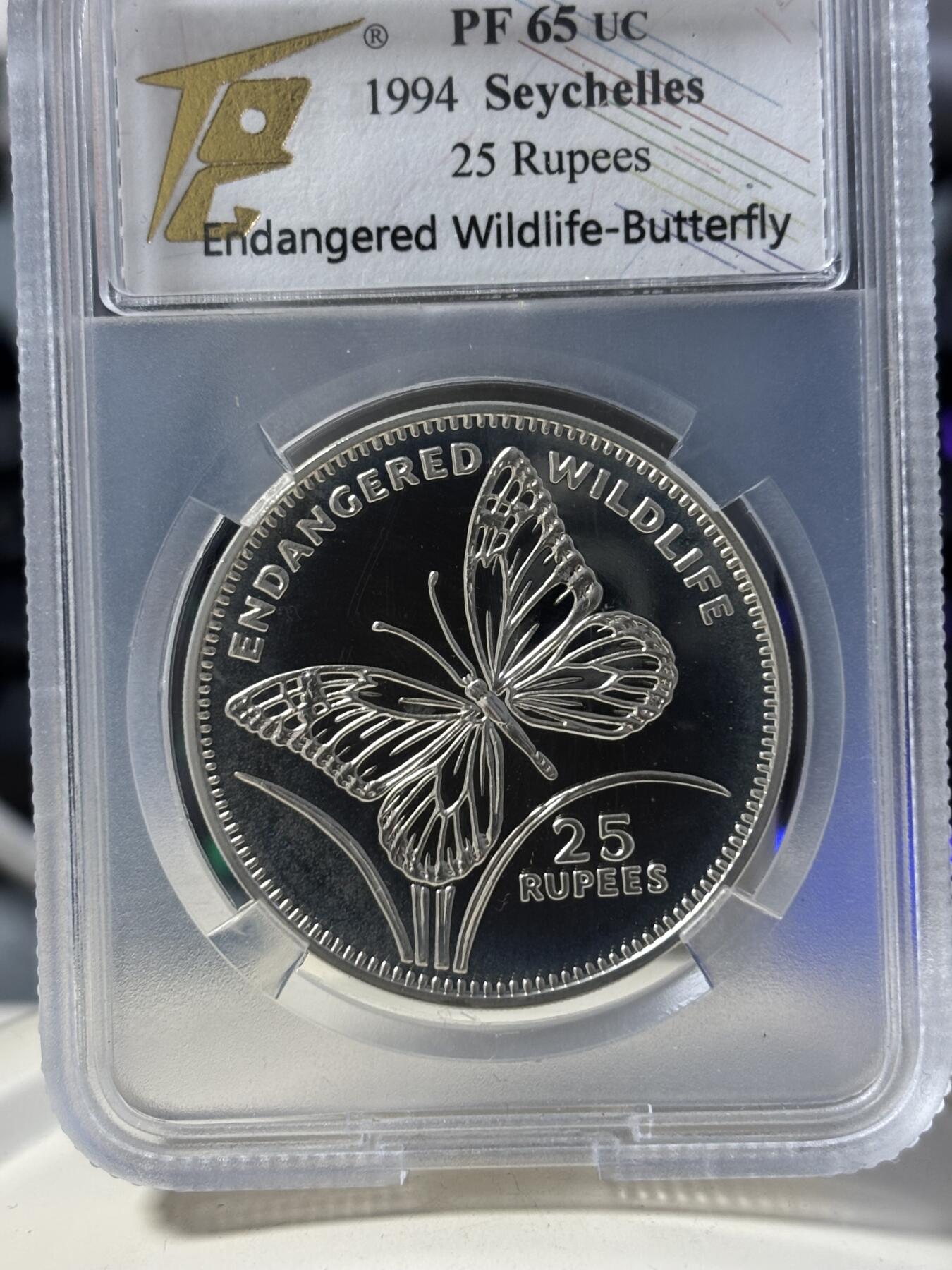第182期拍卖 塞舌尔1994年珍稀动物系列蝴蝶纪念银币TQG-PF65，925银，28.28克