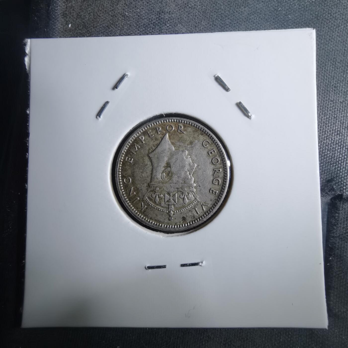 沼泽如烟--第910场 斐济1943年6便士银币