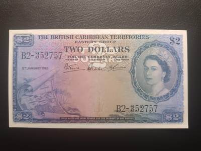 2025十一月第五期，总第203期 - 英属加勒比领地（现东加勒比共同体）1953年2元流通好品XF，大皇冠女王和各构成殖民地徽章，稀有面值