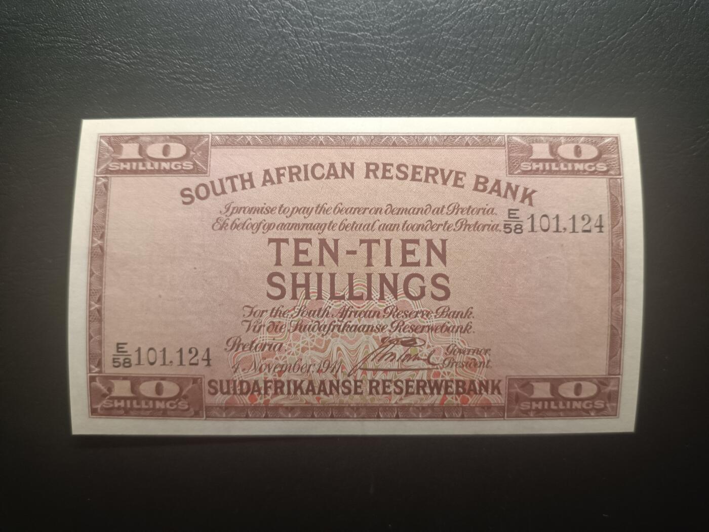 2025十一月第五期，总第203期 南非1941年10先令AUNC英文在前版本，少见南非镑辅币券品种