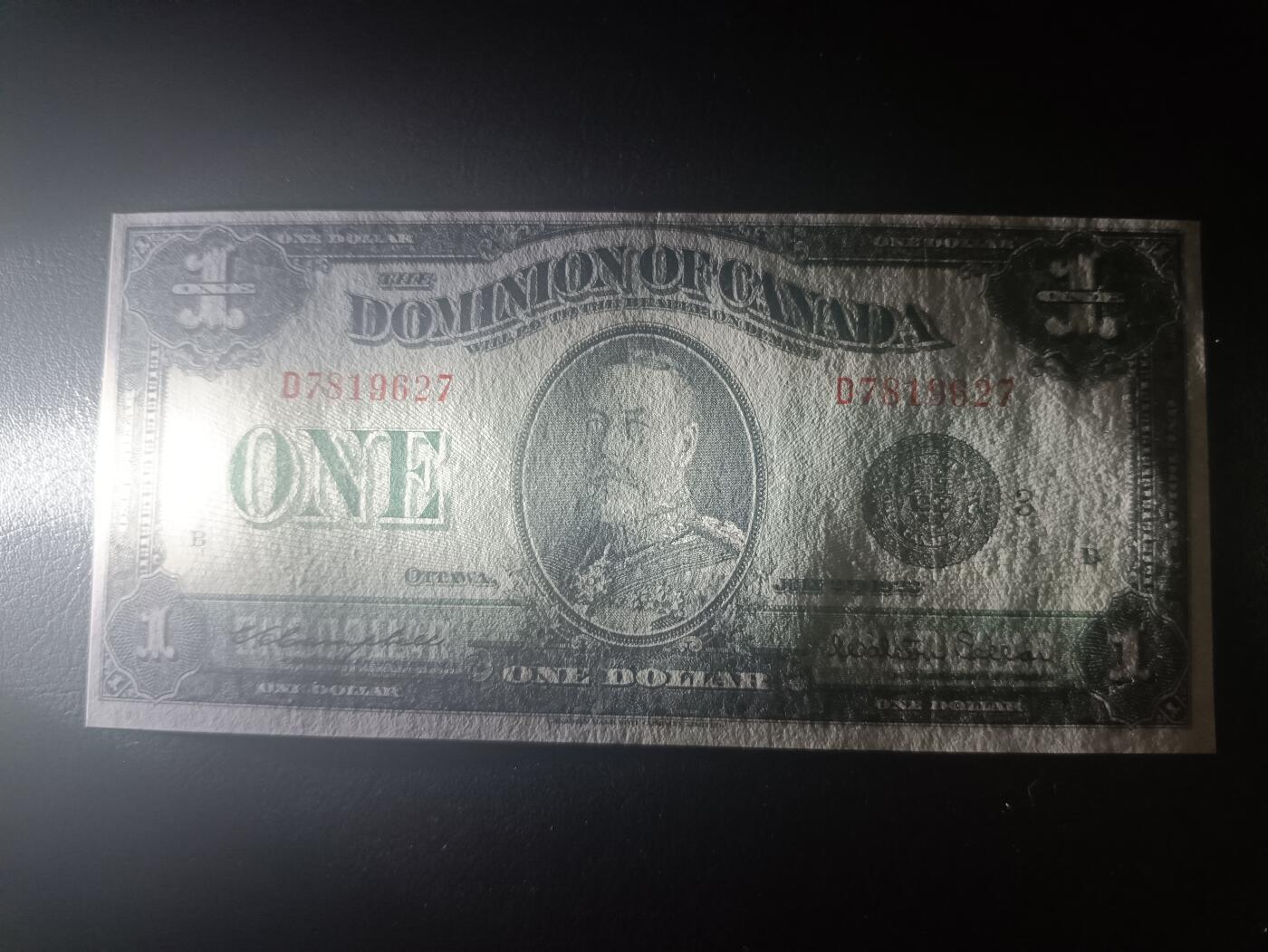 2025十一月第五期，总第203期 加拿大1923版1元流通好品XF，乔治五世国王和渥太华的议会大楼图书馆