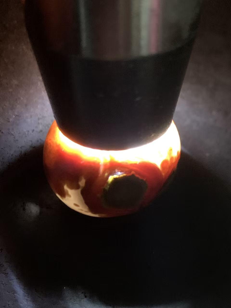 精美亚光高玉化战国红玛瑙雕刻天眼图案随形圆珠一个！