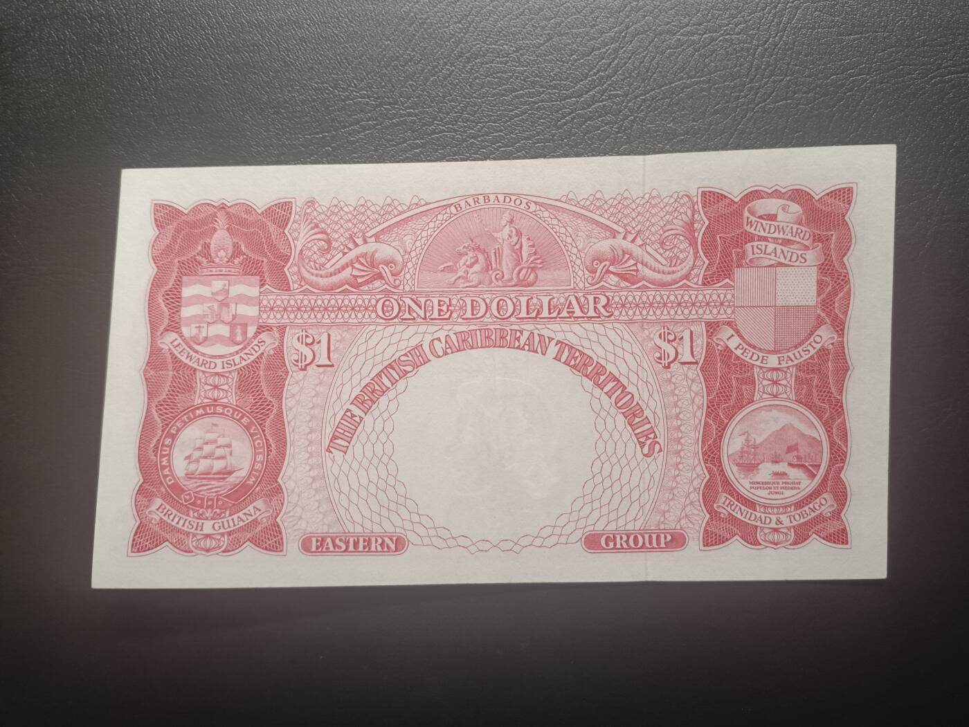 2025十一月第五期，总第203期 英属加勒比领地（现东加勒比共同体）1964年1元AUNC，大皇冠女王和各构成殖民地徽章