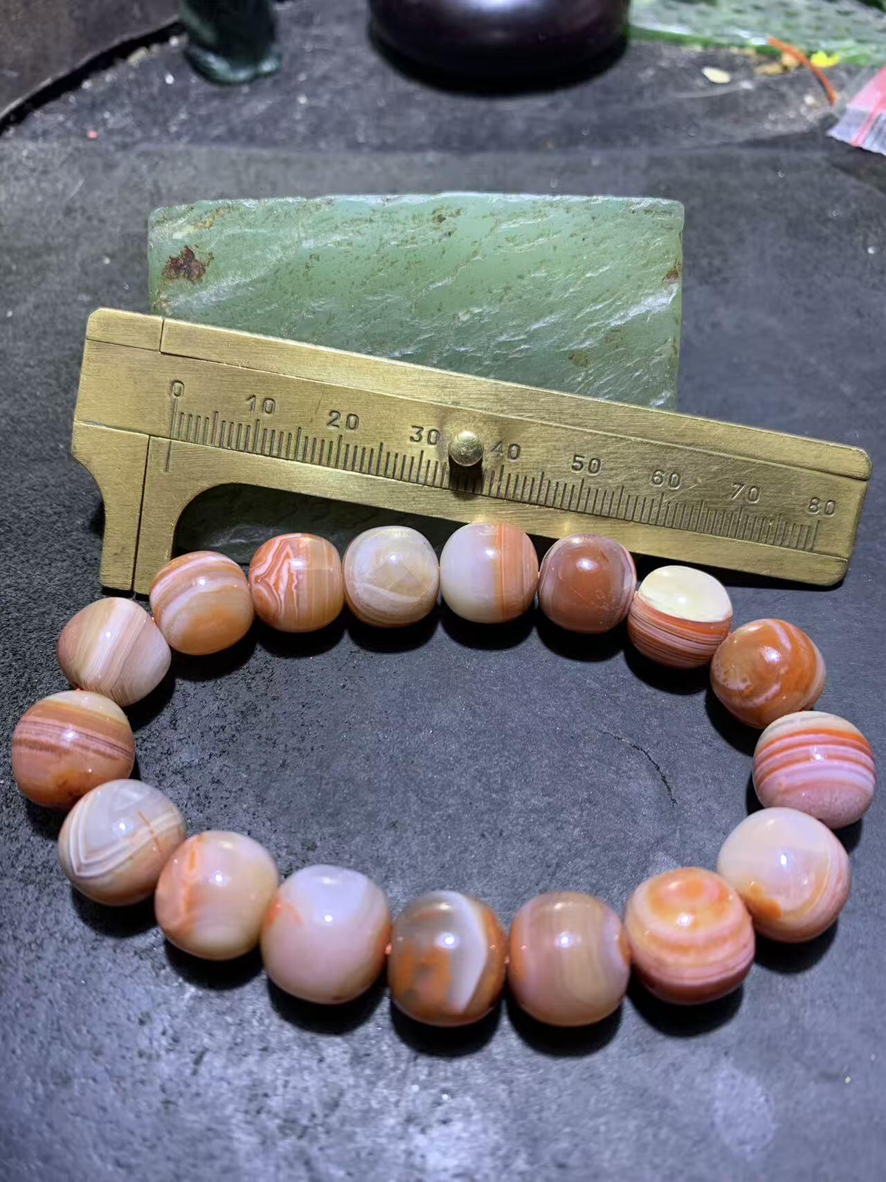 川料南红玛瑙随形原皮老形桶珠手串一条，