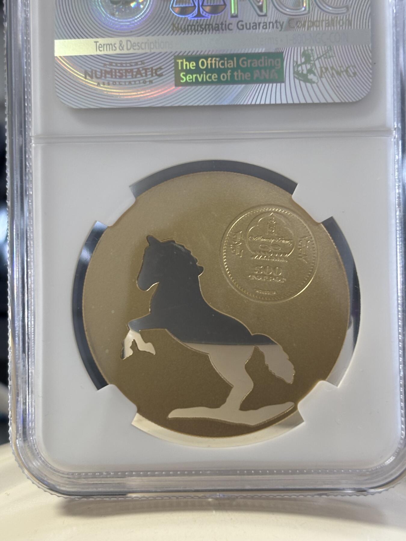 第182期拍卖 蒙古2014年自然动物系列骏马镂空镀金银币NGC-MS69，1/2盎司，925银镀金