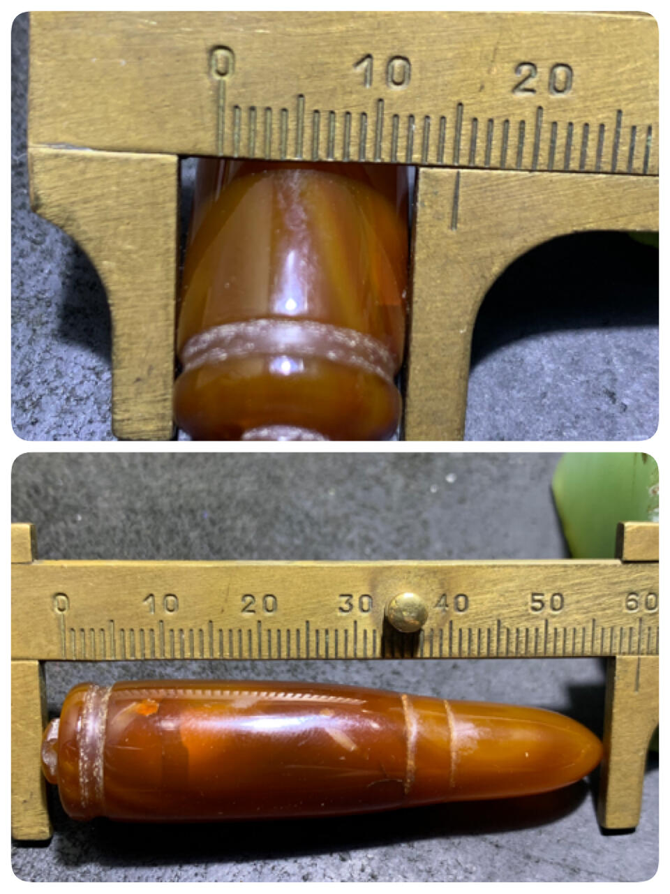 缠丝玛瑙雕刻通货子 弹头吊坠一个，