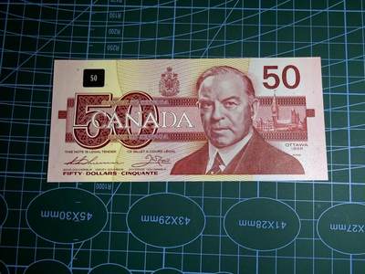 【炜奕收藏】，第五十一期 - 1988年加拿大50元，UNC品相，背面轻微荧光粉，号码无4