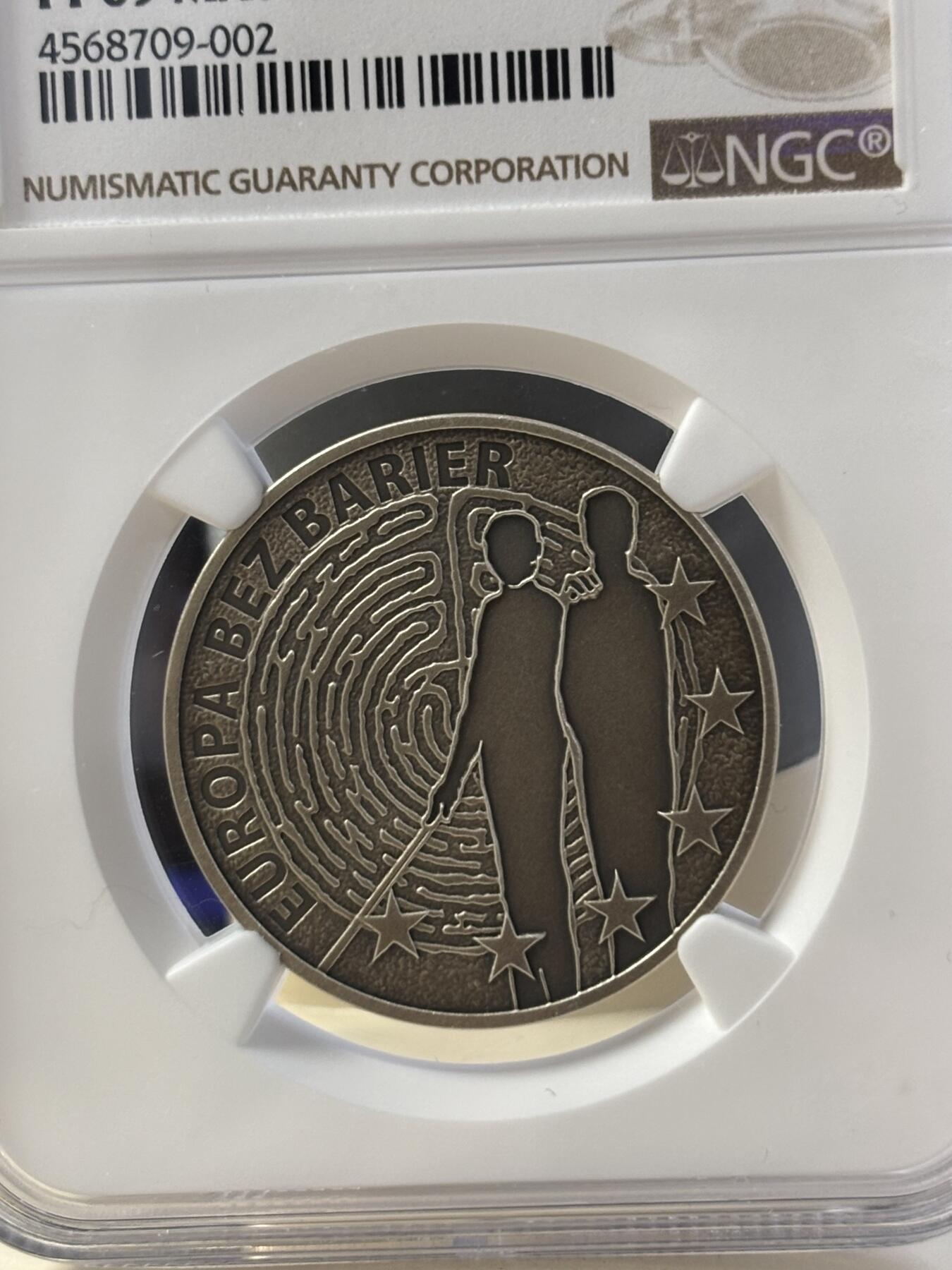 第182期拍卖 获奖币波兰2011年盲人保护协会成立100周年纪念银币NGC-PF69,14.14克，2013年克劳斯最富激情币