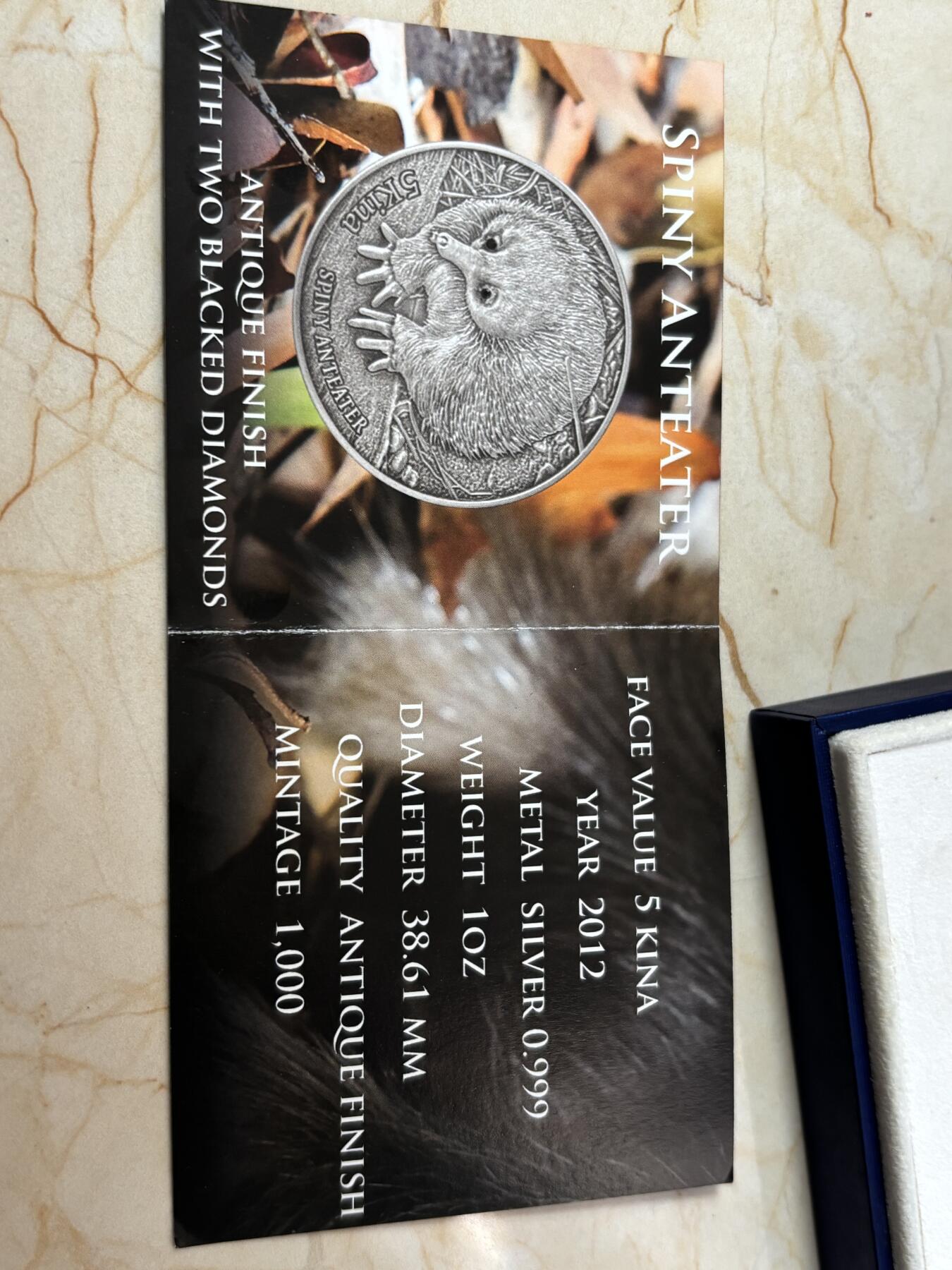 第182期拍卖 巴布亚新几内亚2012年动物针鼹食蚁兽镶黑钻石银币，999银，发行1000枚