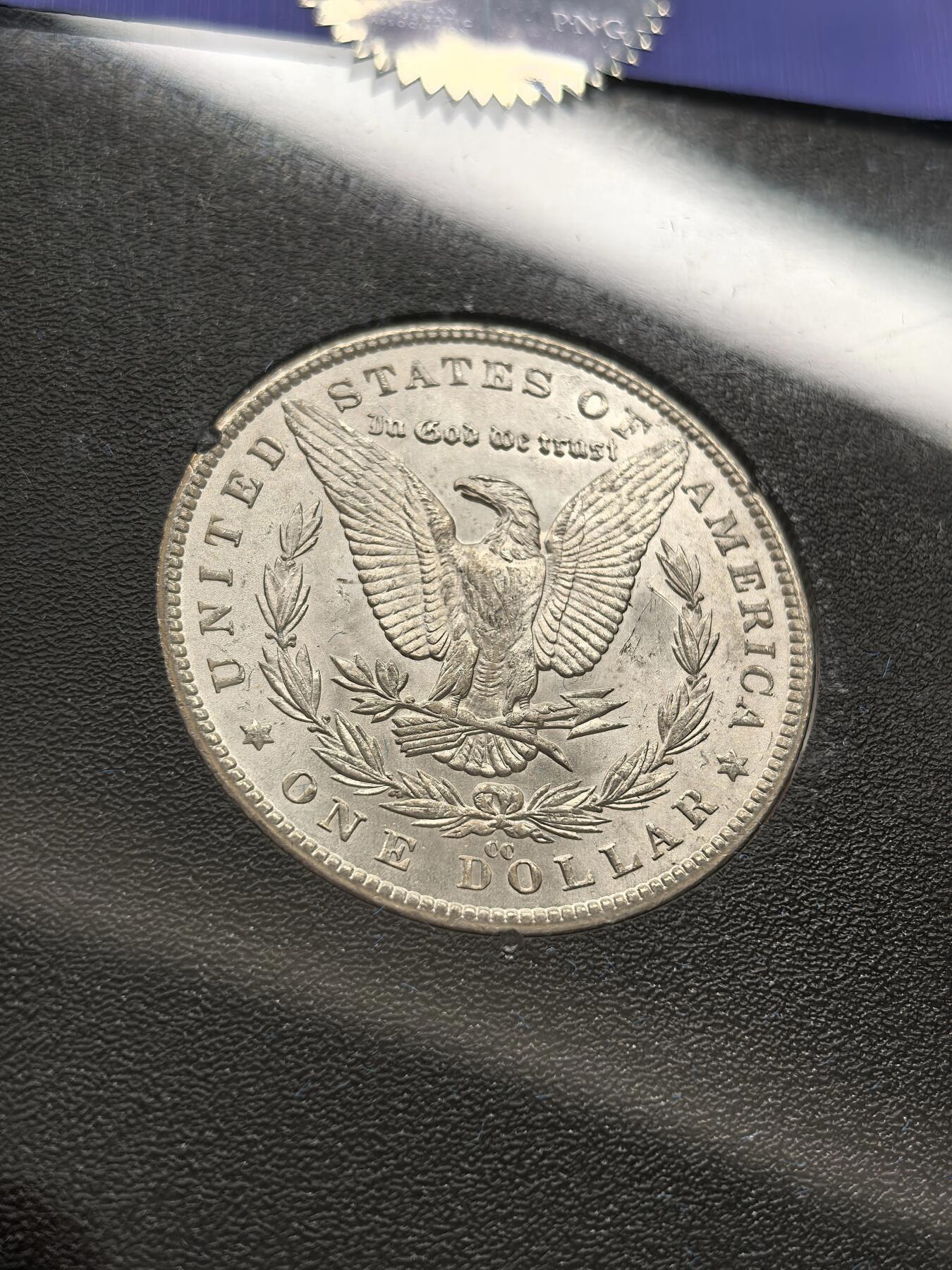 博洋堂藏家专场系列之美国钱币白金之夜专场暨第148期（全场包邮） NGC MS64 美国1882 CC 摩根 卡森厂 GSA大封装 附原盒及证书 人像面橘红色老包浆 高分难得 十字转光