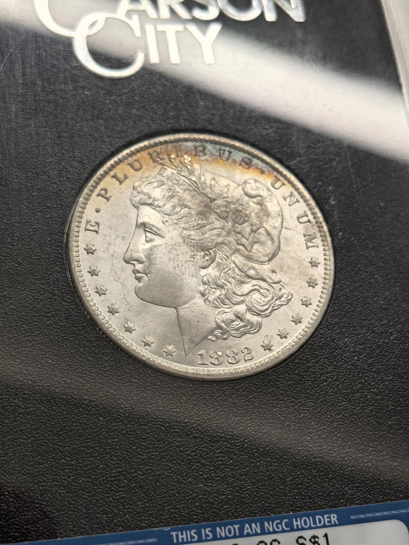 博洋堂藏家专场系列之美国钱币白金之夜专场暨第148期（全场包邮） NGC MS64 美国1882 CC 摩根 卡森厂 GSA大封装 人像面月牙形彩虹包浆 高分难得 十字转光