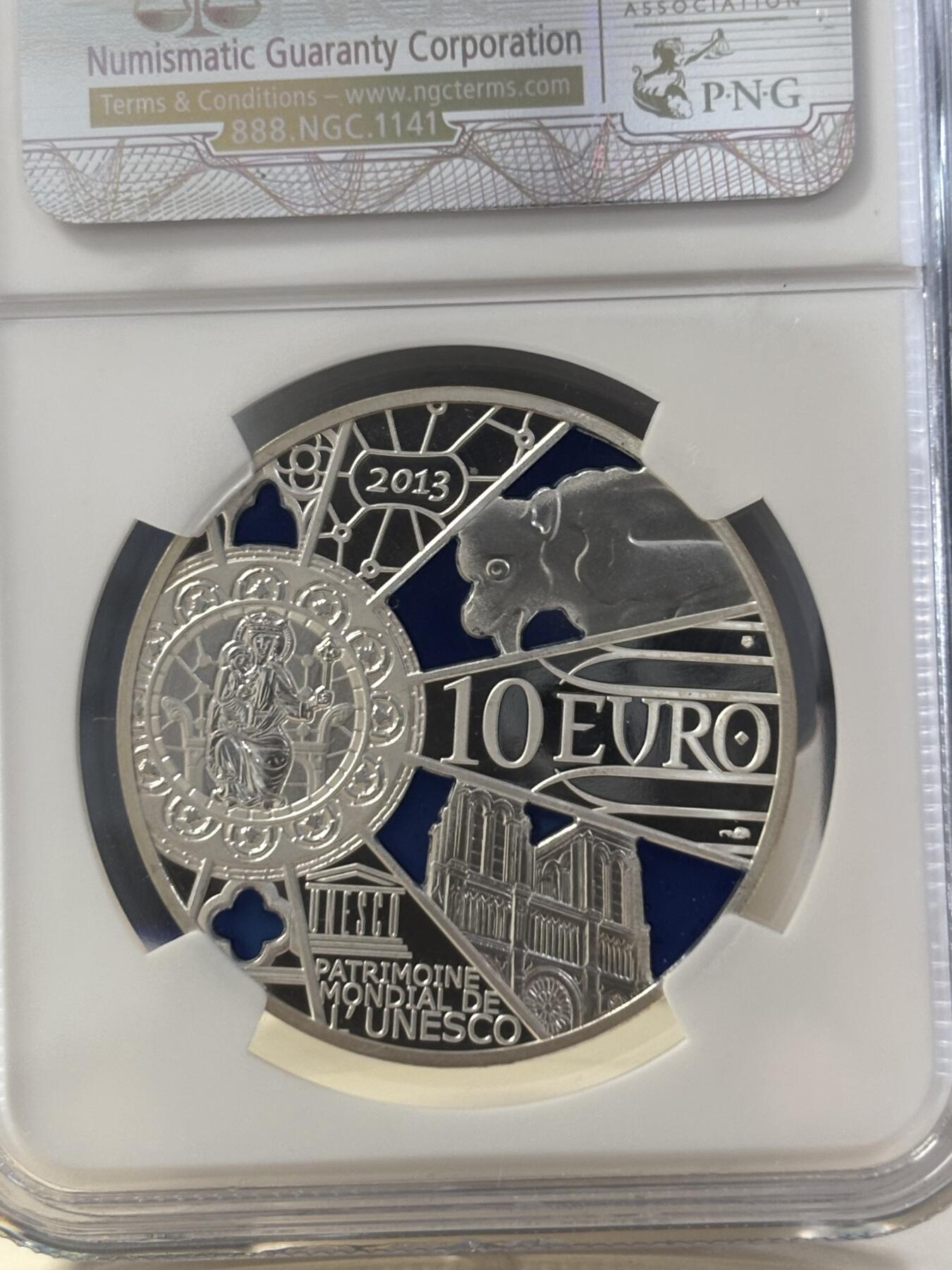 第182期拍卖 法国2013年巴黎圣母院850周年通透彩色精制银币NGC-PF69,21克。900银，发行10000枚