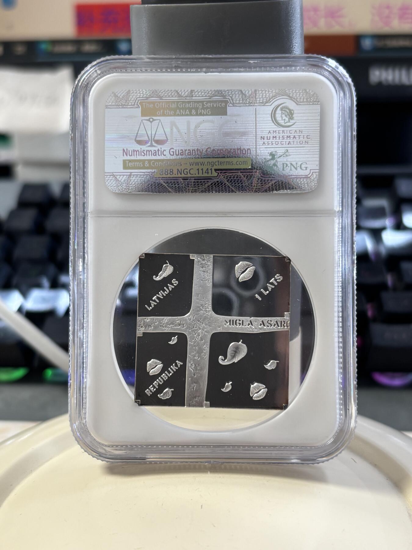 第182期拍卖 获奖币拉脱维亚2011年诗人萨克斯蒙着雾的窗精制纪念银币NGC-PF69,26克，925银，发行7000枚