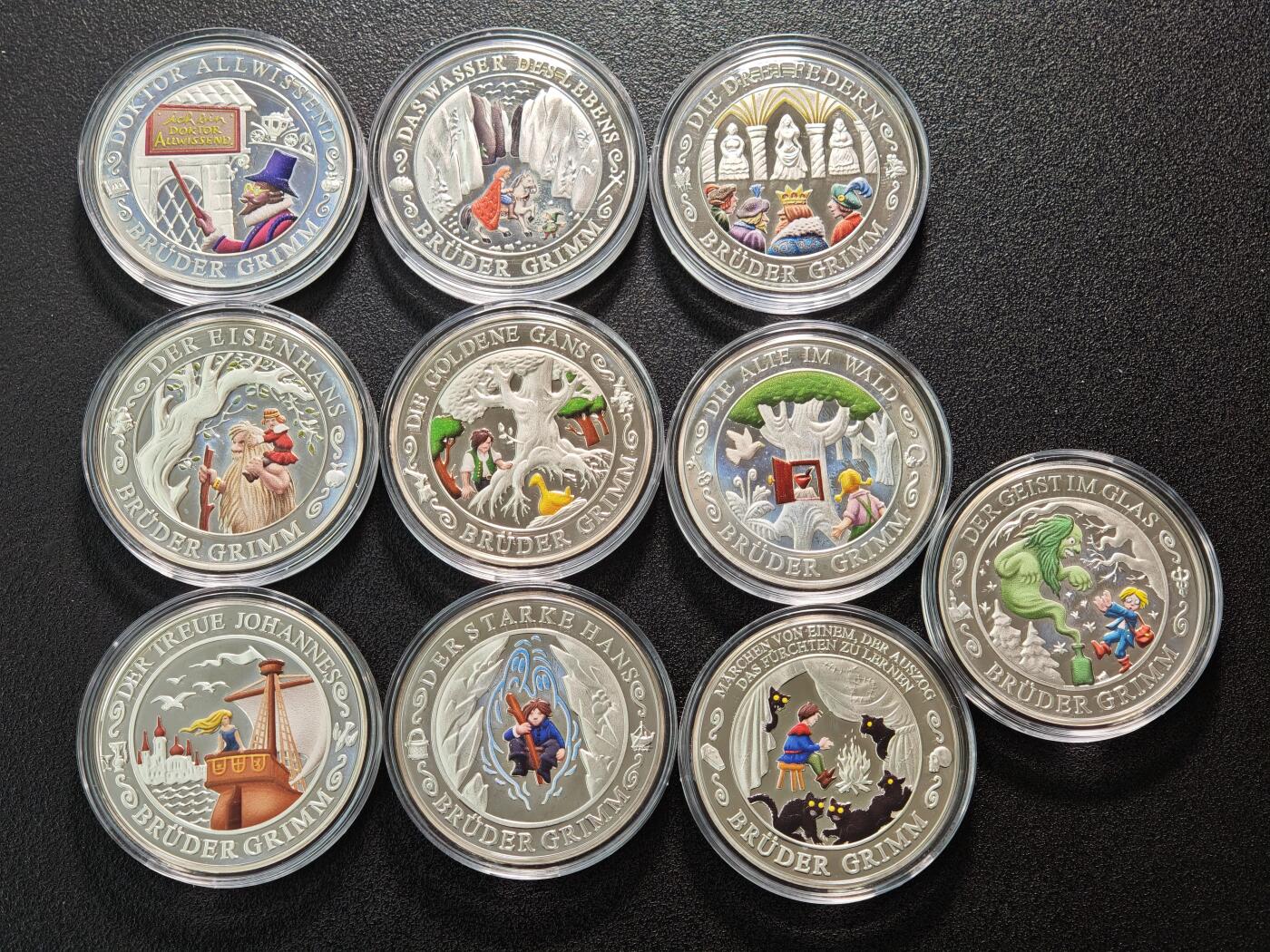【德藏】世界币章拍卖第154期（拍品征集中~欢迎藏友联系） 10枚一册 德国童话故事彩绘纪念银章 原盒 原证书 （36mm/枚 333银/枚 14.66g/枚）设计极其精美