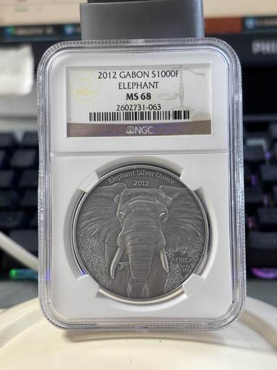 第182期拍卖 - 加蓬2012年非洲野生动物系列大象仿古银币NGC-MS68，1盎司，999银