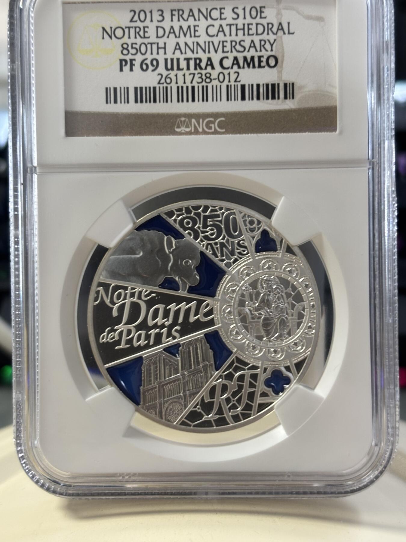 第182期拍卖 法国2013年巴黎圣母院850周年通透彩色精制银币NGC-PF69,21克。900银，发行10000枚