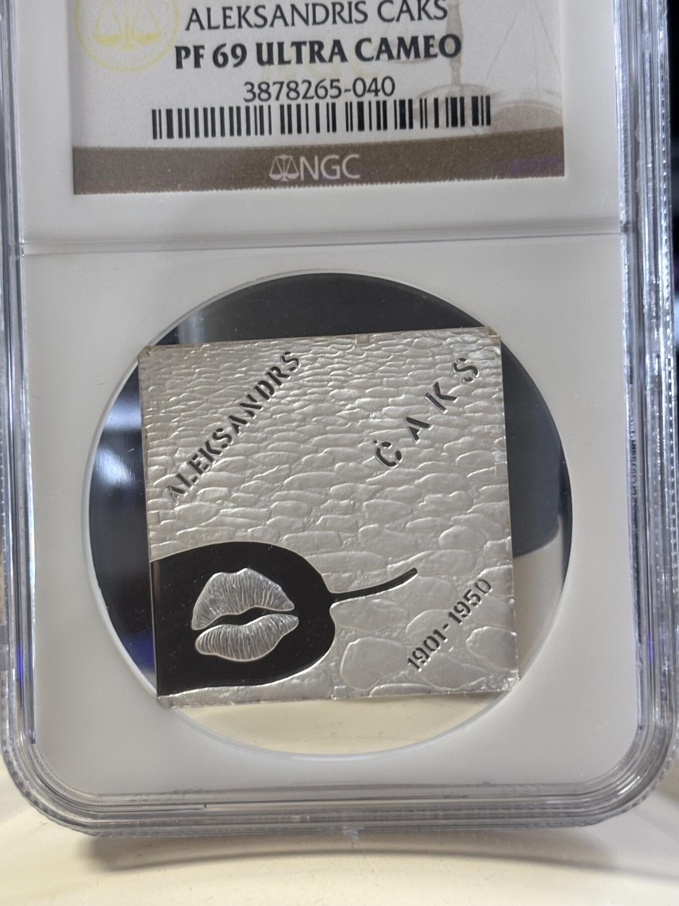 第182期拍卖 获奖币拉脱维亚2011年诗人萨克斯蒙着雾的窗精制纪念银币NGC-PF69,26克，925银，发行7000枚