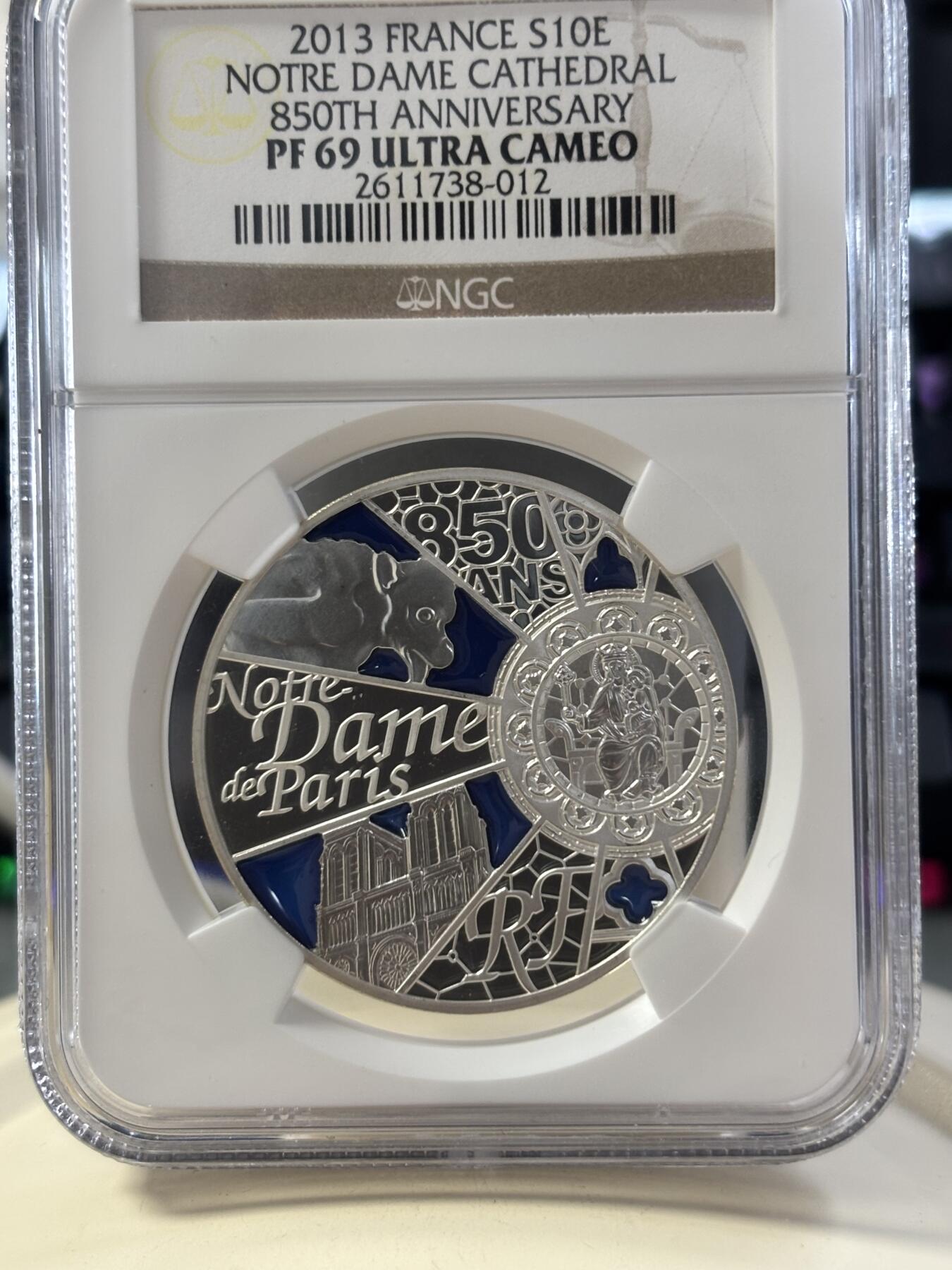 第182期拍卖 法国2013年巴黎圣母院850周年通透彩色精制银币NGC-PF69,21克。900银，发行10000枚