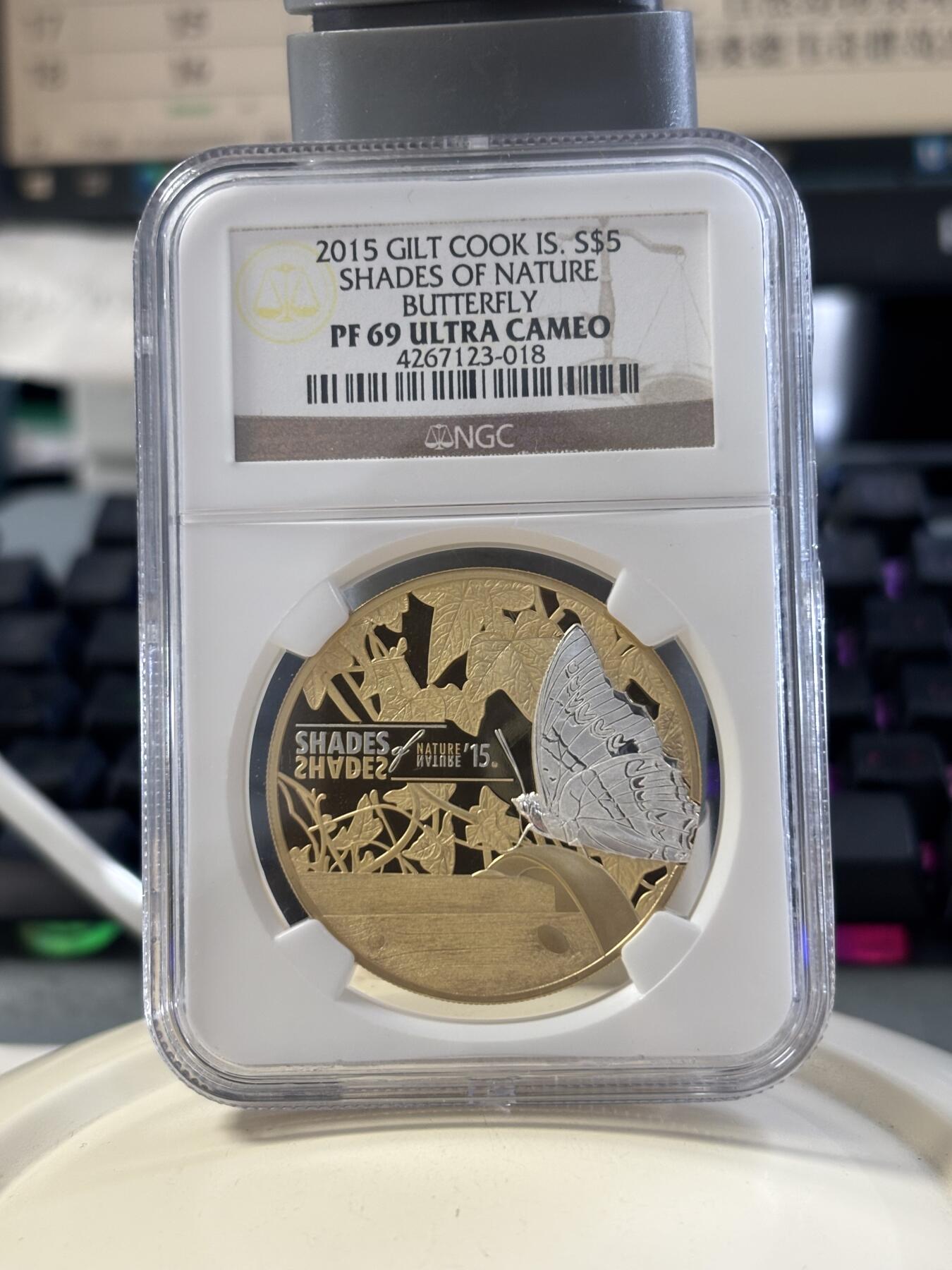 第182期拍卖 库克2015年自然之影蝴蝶激光三维微雕精制镀金纪念银币NGC-PF69，25克，925银