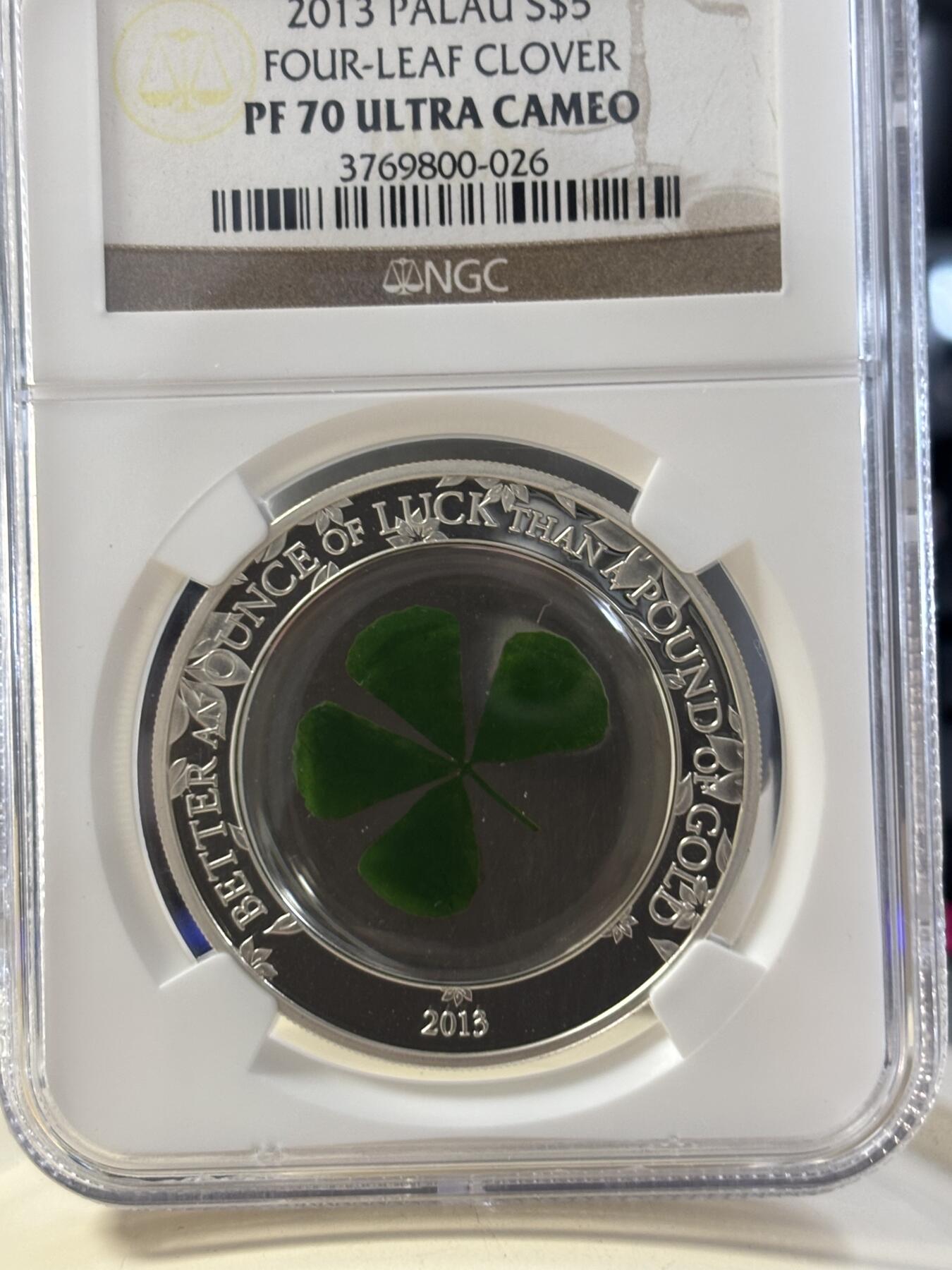 第182期拍卖 帕劳2013年镶嵌实物四叶草精制银币NGC-PF69,1盎司，999银