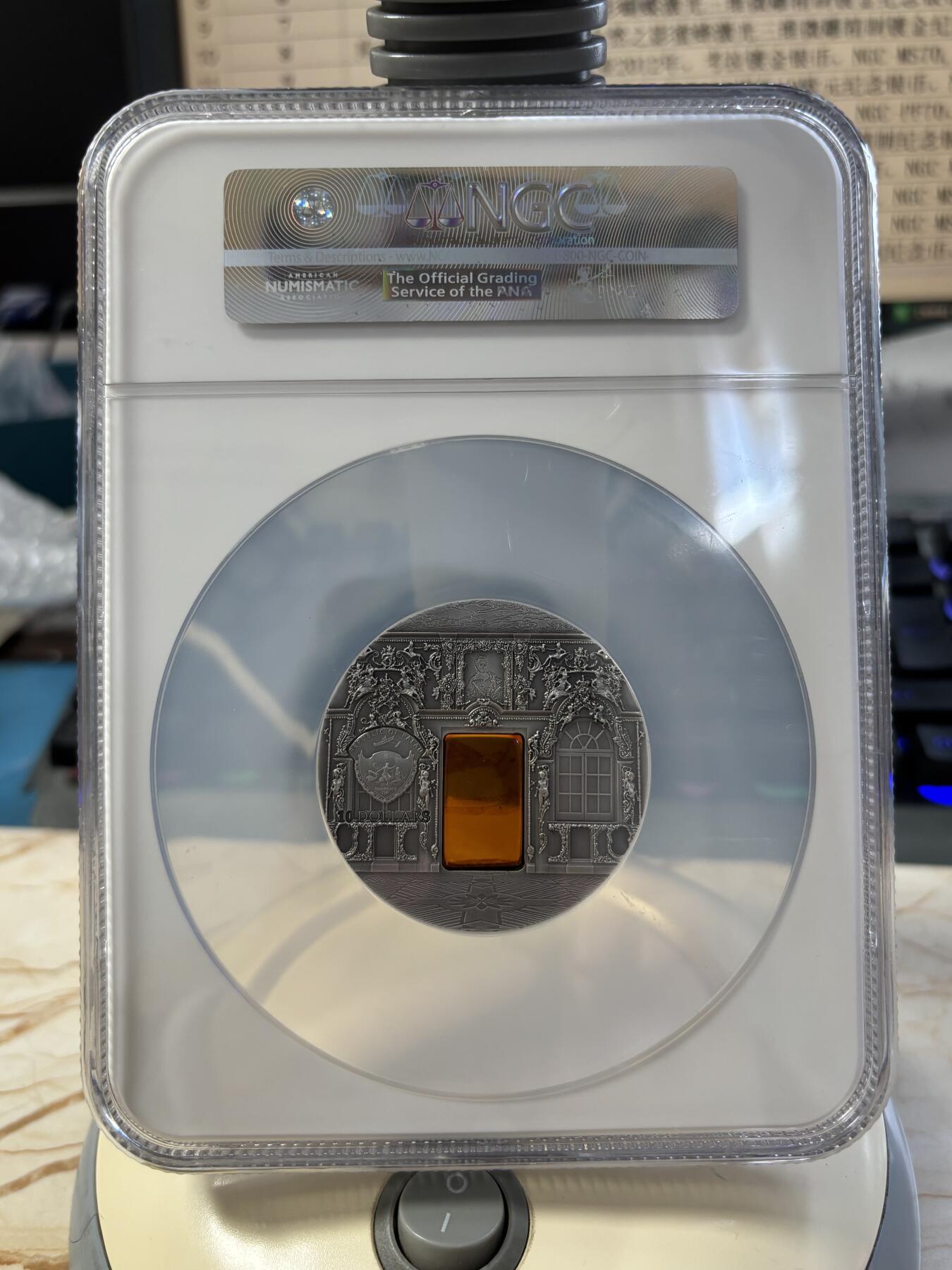 第182期拍卖 帕劳2009年矿物艺术琥珀镶嵌圣加大教堂仿古银币NGC-PF69无盒无证书，2盎司，999银，