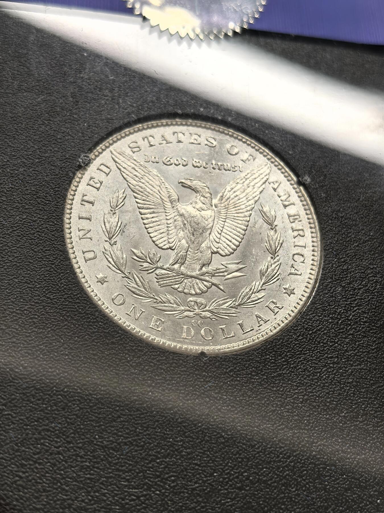 博洋堂藏家专场系列之美国钱币白金之夜专场暨第148期（全场包邮） NGC MS63 美国1882 CC 摩根 卡森厂 GSA大封装 附原盒及证书 人像面覆盖金黄色包浆 高分难得 十字转光