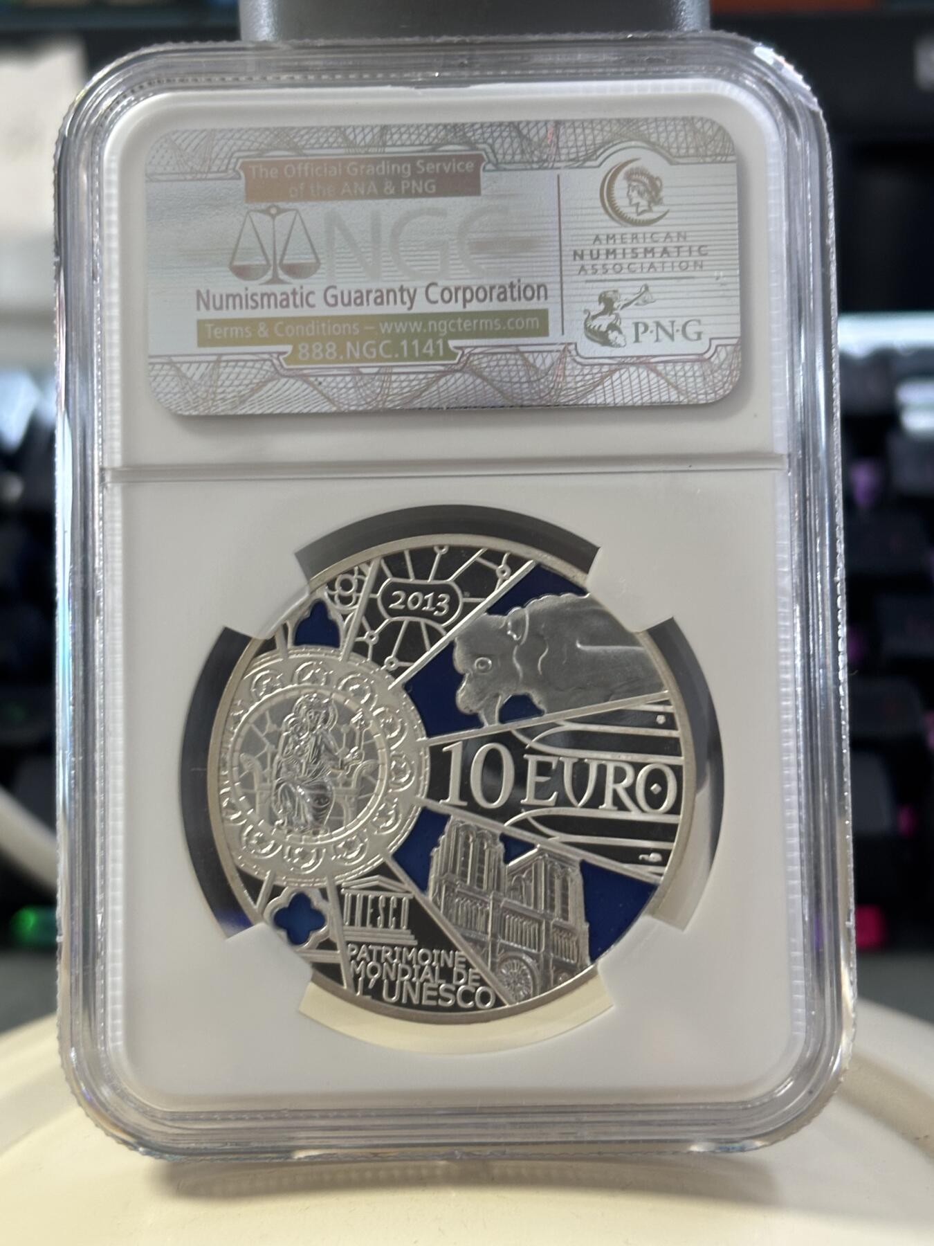 第182期拍卖 法国2013年巴黎圣母院850周年通透彩色精制银币NGC-PF69,21克。900银，发行10000枚