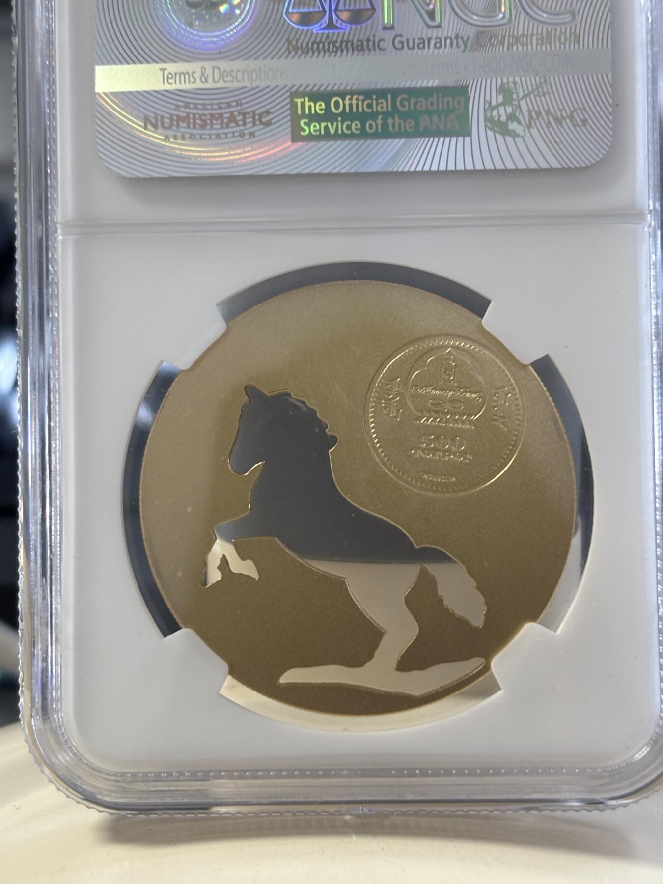 第182期拍卖 蒙古2014年自然动物系列骏马镂空镀金银币NGC-MS69，1/2盎司，925银镀金