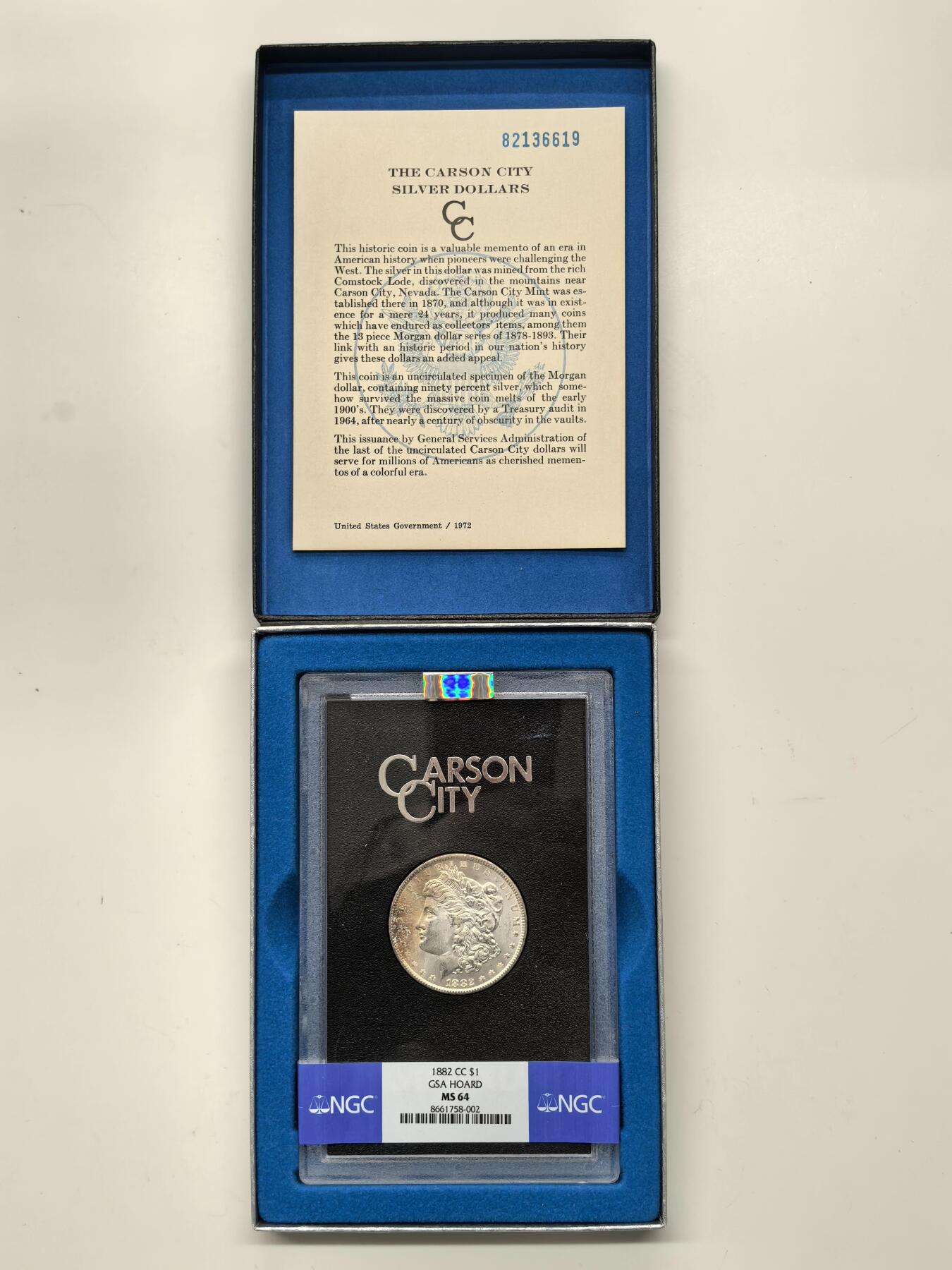 博洋堂藏家专场系列之美国钱币白金之夜专场暨第148期（全场包邮） NGC MS64 美国1882 CC 摩根 卡森厂 GSA大封装 附原盒及证书 人像面橘红色老包浆 高分难得 十字转光