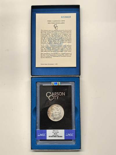 博洋堂藏家专场系列之美国钱币白金之夜专场暨第148期（全场包邮） - NGC MS64 美国1882 CC 摩根 卡森厂 GSA大封装 附原盒及证书 人像面橘红色老包浆 高分难得 十字转光
