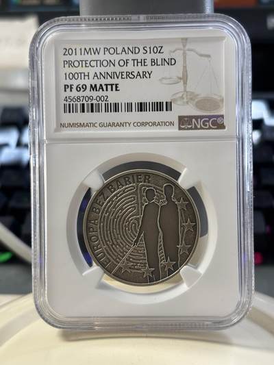 第182期拍卖 - 获奖币波兰2011年盲人保护协会成立100周年纪念银币NGC-PF69,14.14克，2013年克劳斯最富激情币
