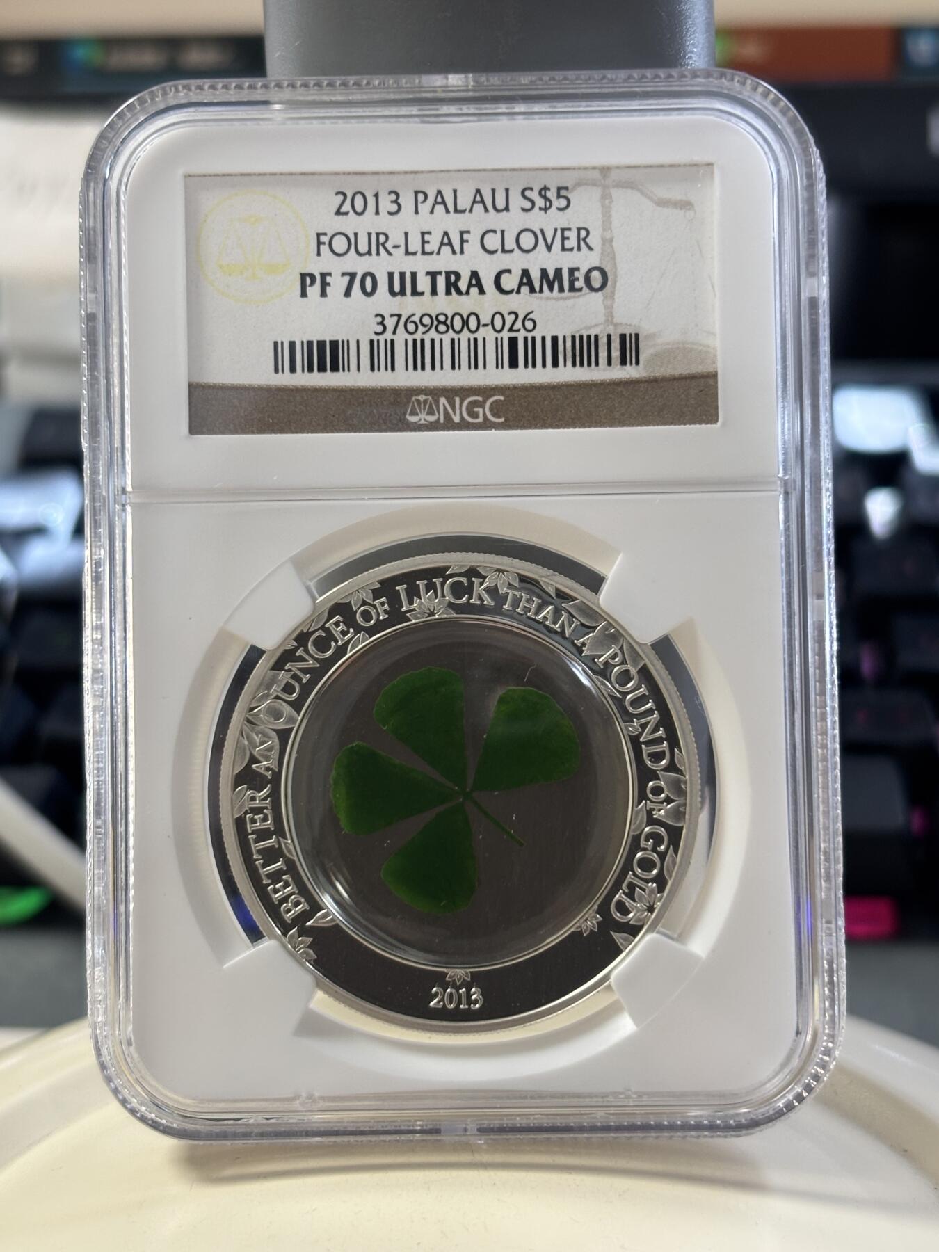 第182期拍卖 帕劳2013年镶嵌实物四叶草精制银币NGC-PF69,1盎司，999银