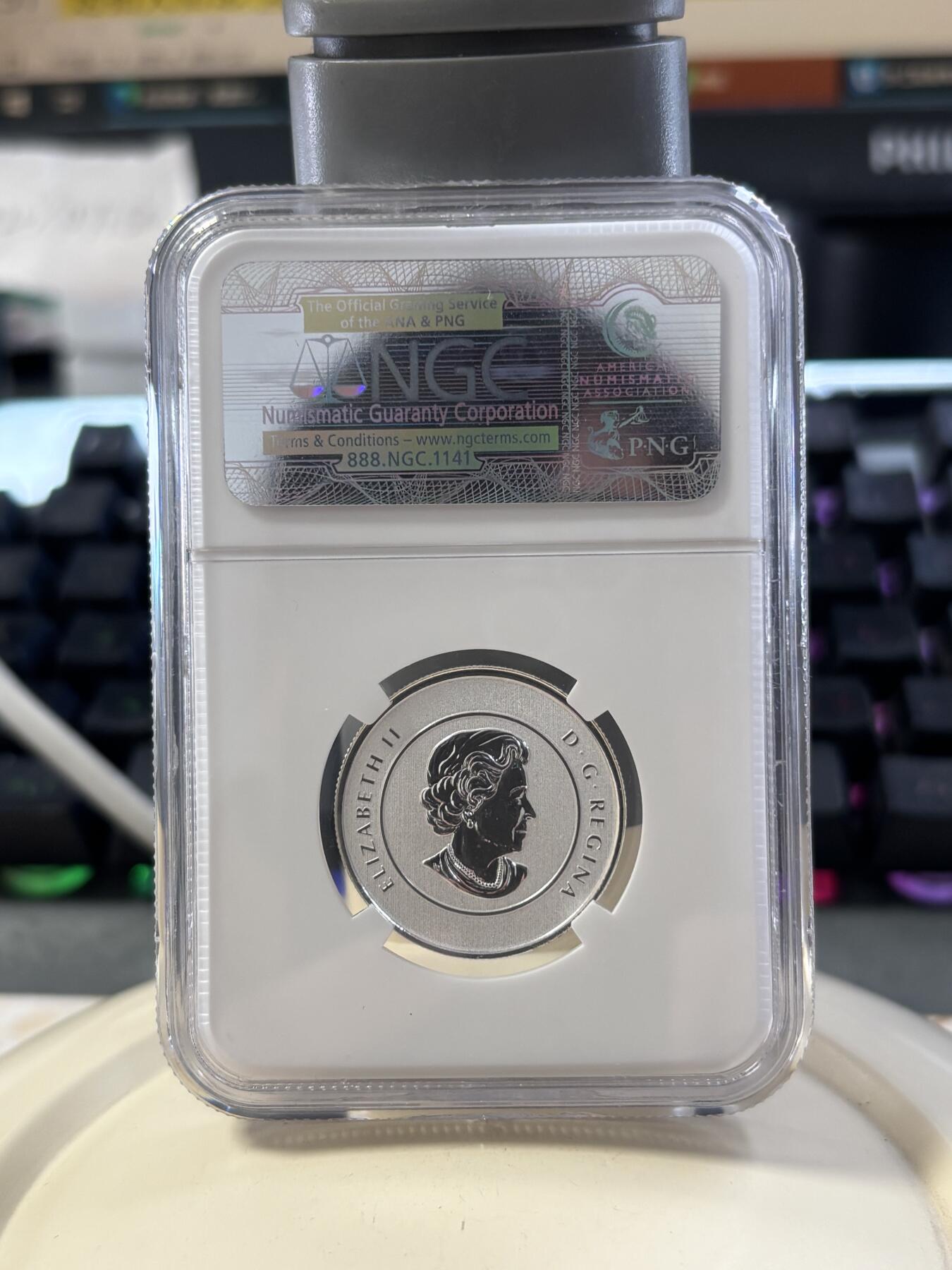 第182期拍卖 加拿大2012年20换20系列圣诞节驯鹿银币NGC-SP70，1/4盎司，9999银