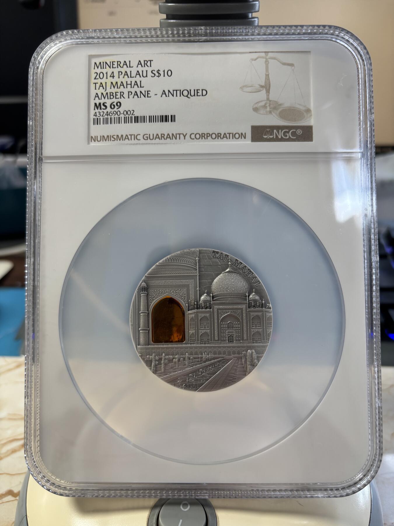 第182期拍卖 帕劳2014年矿物艺术琥珀镶嵌泰姬陵仿古银币NGC-MS69，2盎司，999银