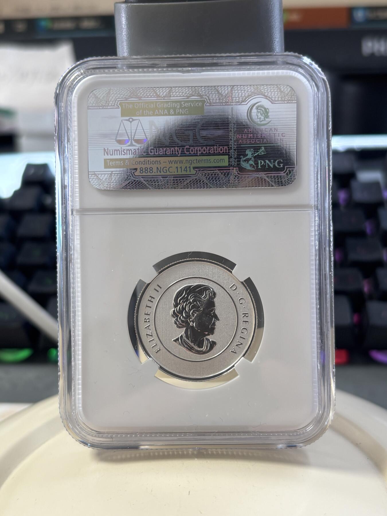 第182期拍卖 加拿大2012年20换20系列枫叶银币NGC-SP69，1/4盎司，9999银