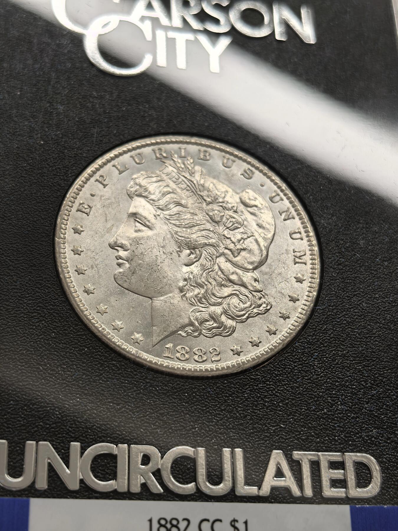 博洋堂藏家专场系列之美国钱币白金之夜专场暨第148期（全场包邮） NGC MS63 美国1882 CC 摩根 卡森厂 GSA大封装 附原盒及证书 鹰面覆盖金黄色包浆 高分难得 十字转光