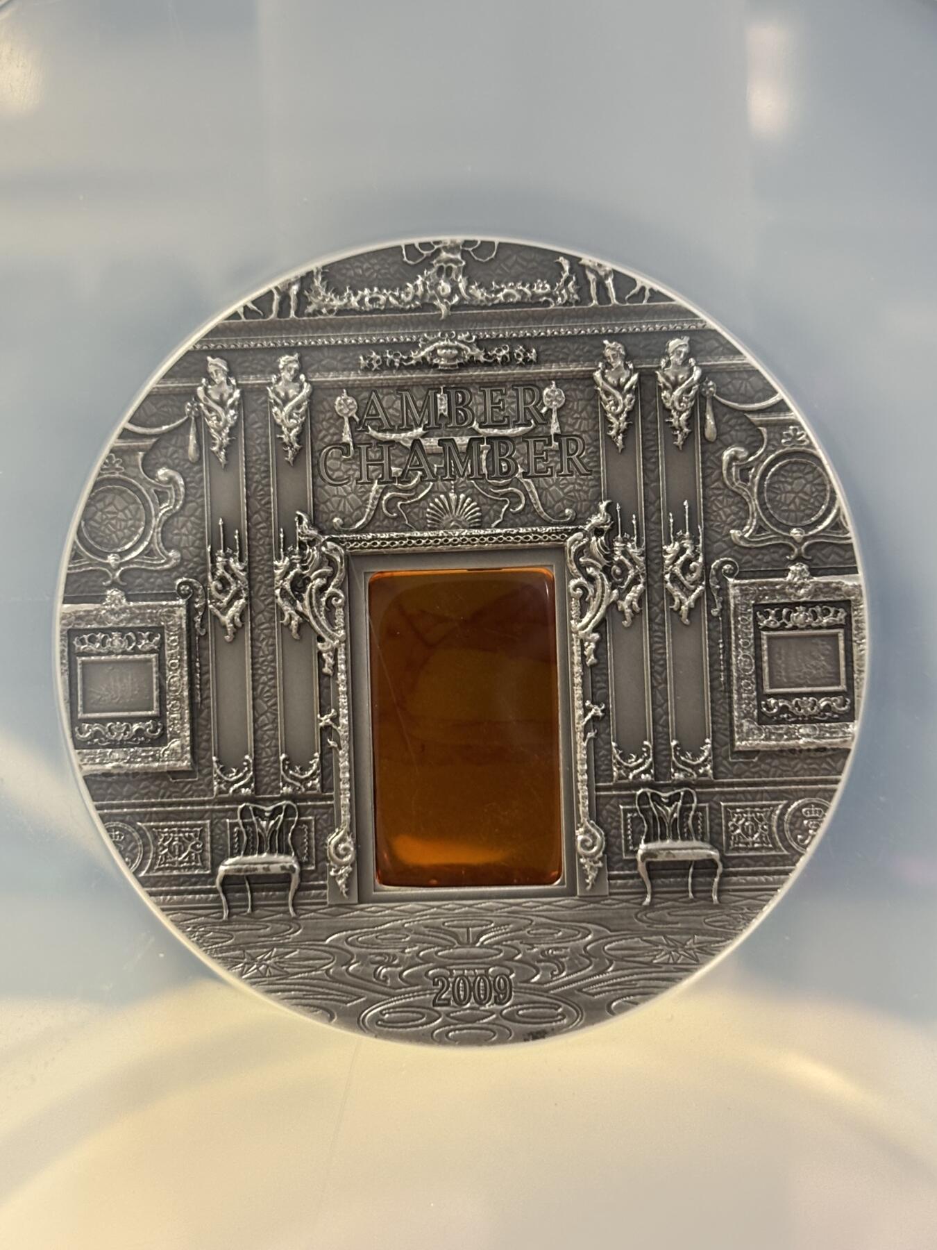 第182期拍卖 帕劳2009年矿物艺术琥珀镶嵌圣加大教堂仿古银币NGC-PF69无盒无证书，2盎司，999银，