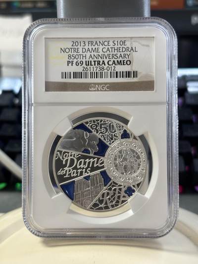 第182期拍卖 - 法国2013年巴黎圣母院850周年通透彩色精制银币NGC-PF69,21克。900银，发行10000枚