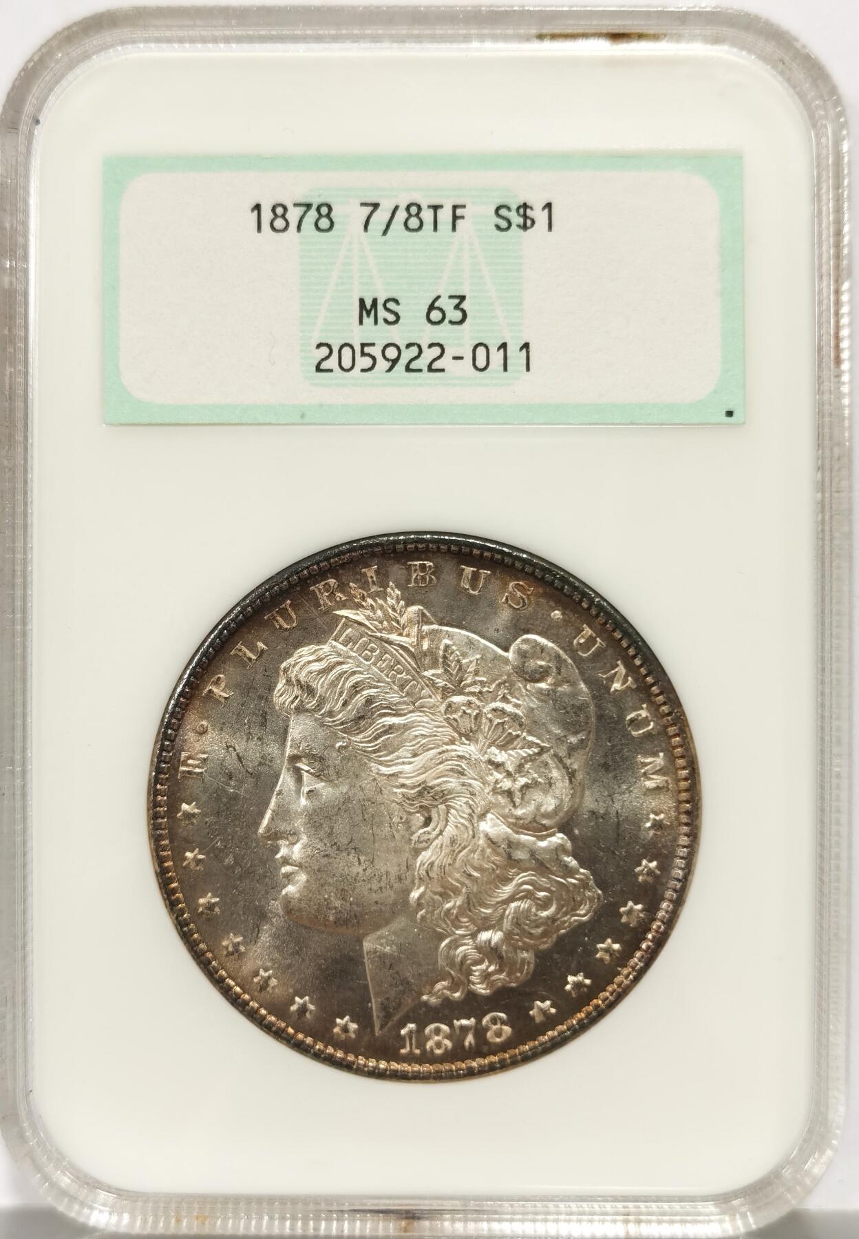 博洋堂世界钱币拍卖第147期（全场包邮） NGC MS63 美国1878年摩根银币，首年摩根，极罕见7羽骑8羽版，数量远少于本就不太多见的8羽版。此枚状态极其出色，环彩+强镜面感，综合看下来完全不逊于过手的64分甚至有机会给PL，NGC非常早期的OGH重评常常有惊喜