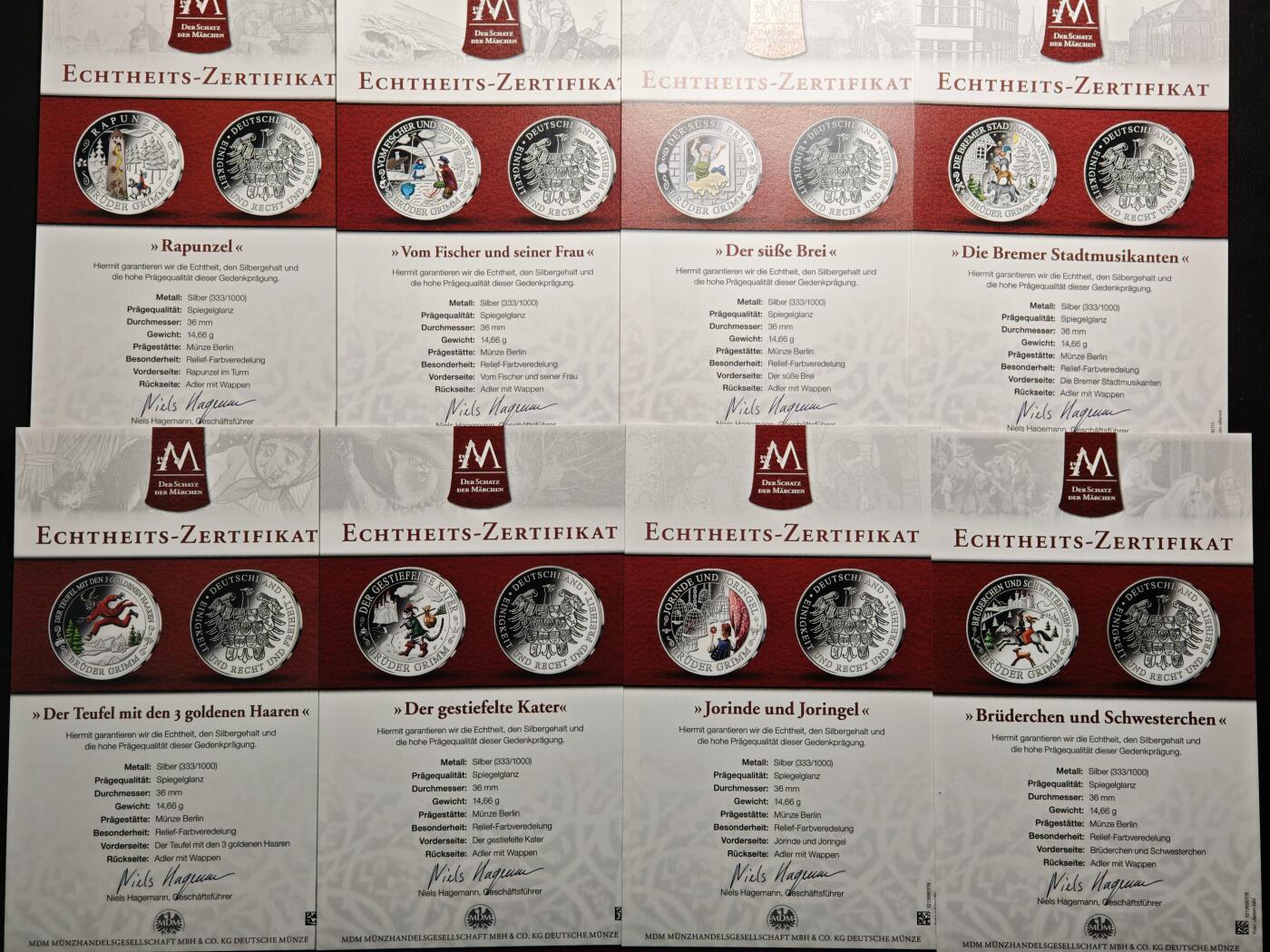 【德藏】世界币章拍卖第154期（拍品征集中~欢迎藏友联系） 10枚一册 德国童话故事彩绘纪念银章 原盒 原证书 （36mm/枚 333银/枚 14.66g/枚）设计极其精美