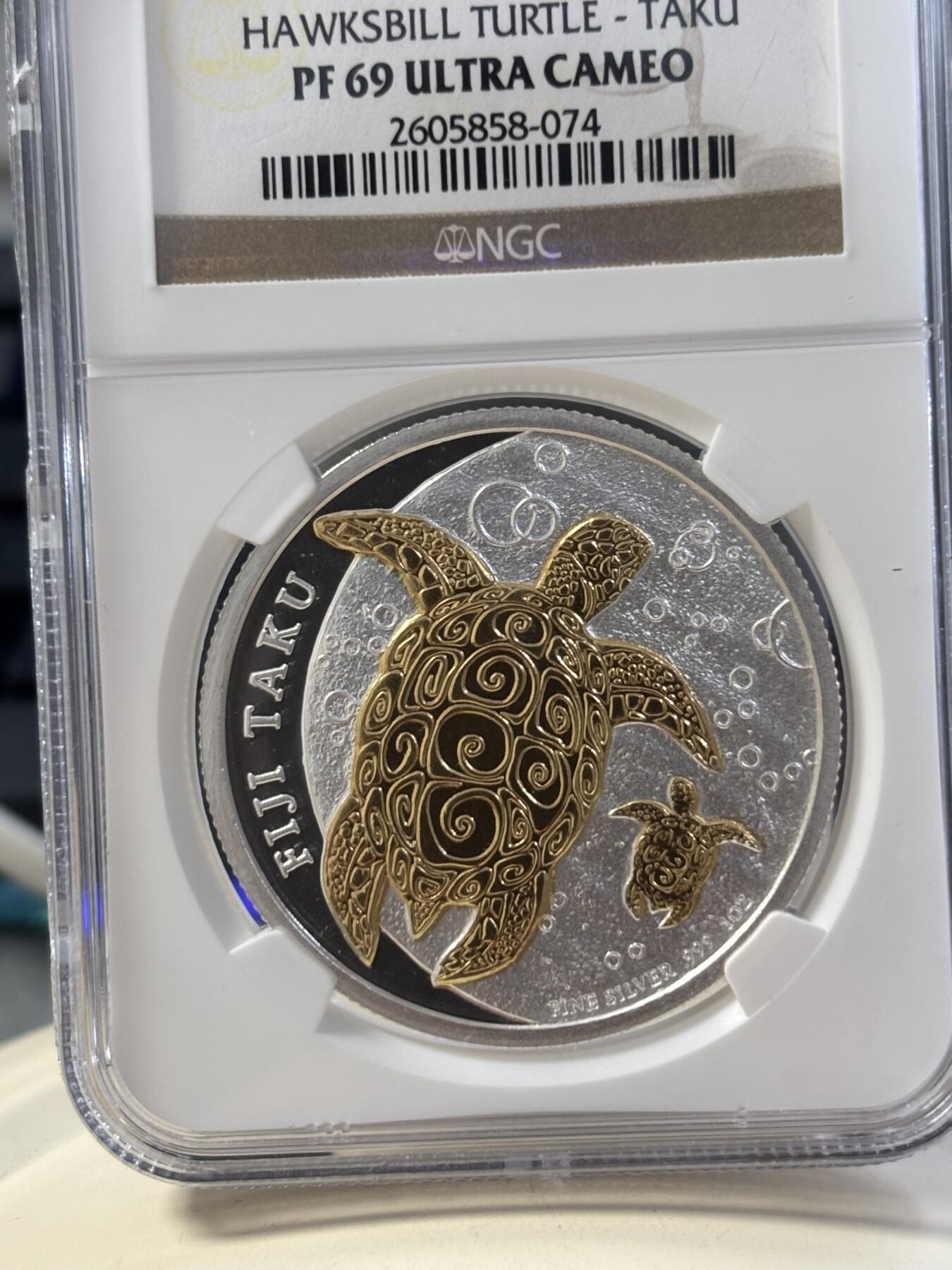 第182期拍卖 斐济2012年海洋生物玳瑁镀金纪念银币NGC-PF69，1盎司。999银