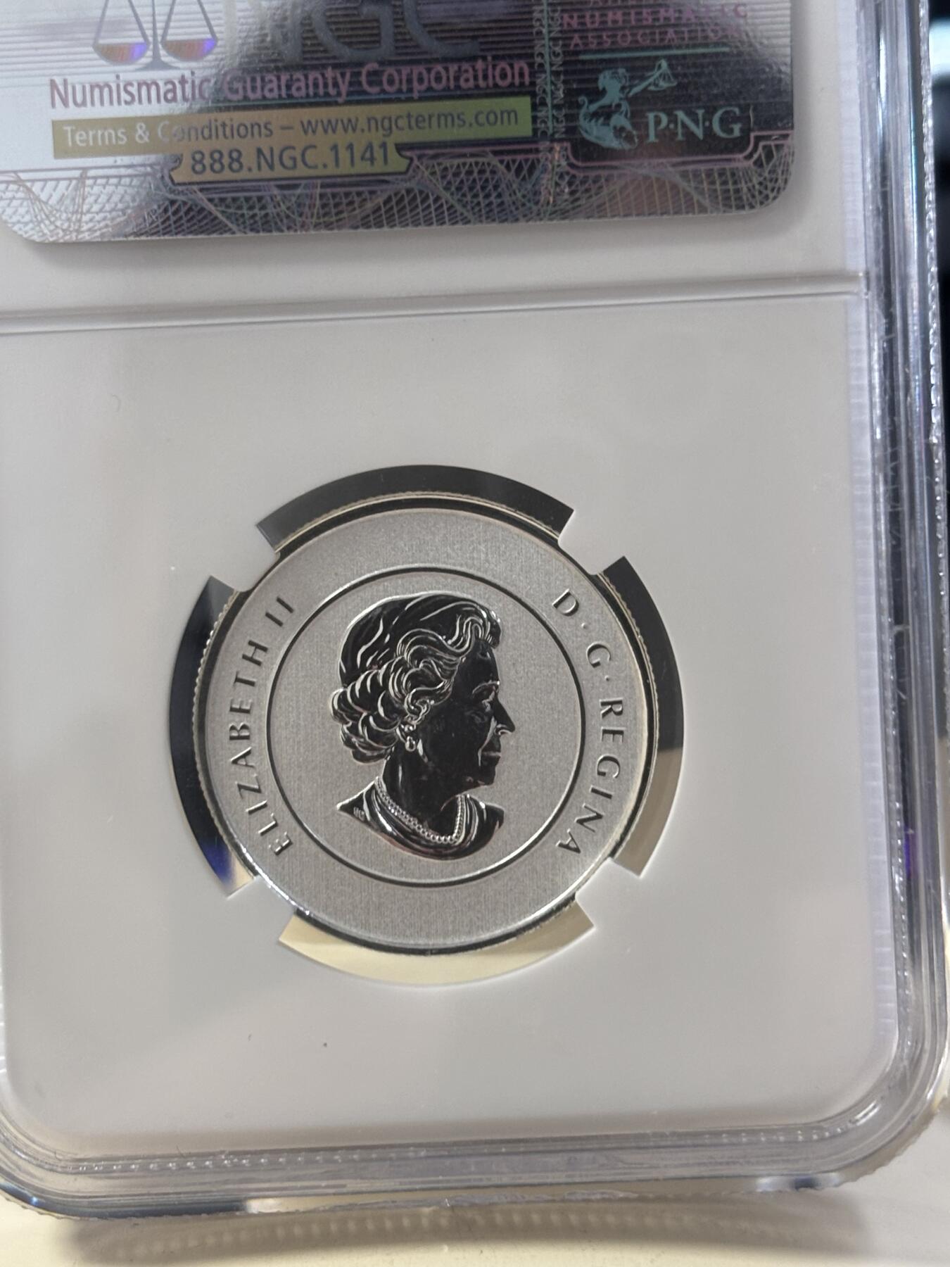 第182期拍卖 加拿大2012年20换20系列圣诞节驯鹿银币NGC-SP70，1/4盎司，9999银