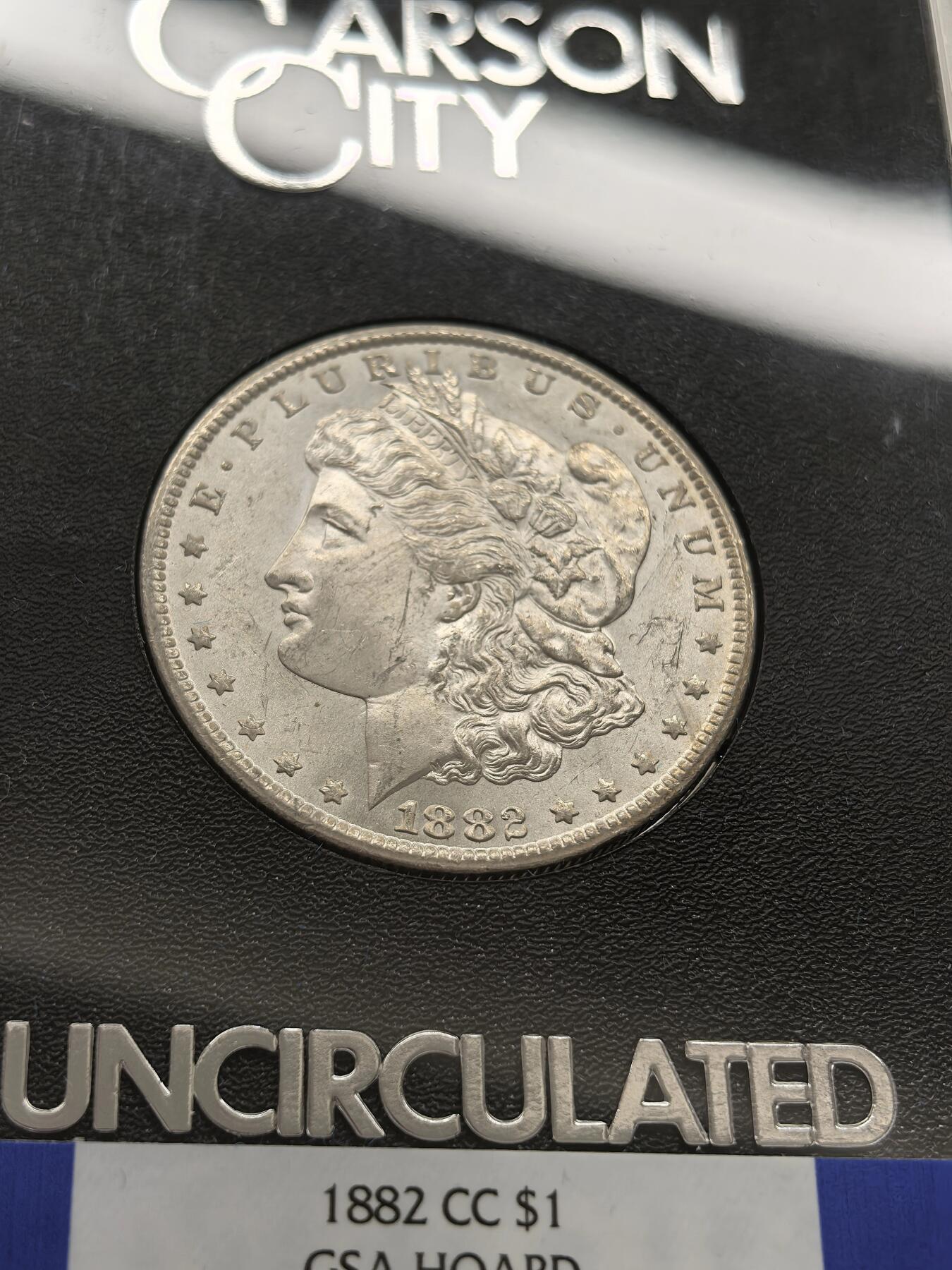 博洋堂藏家专场系列之美国钱币白金之夜专场暨第148期（全场包邮） NGC MS63 美国1882 CC 摩根 卡森厂 GSA大封装 附原盒 双面覆盖淡黄色包浆 高分难得 十字转光